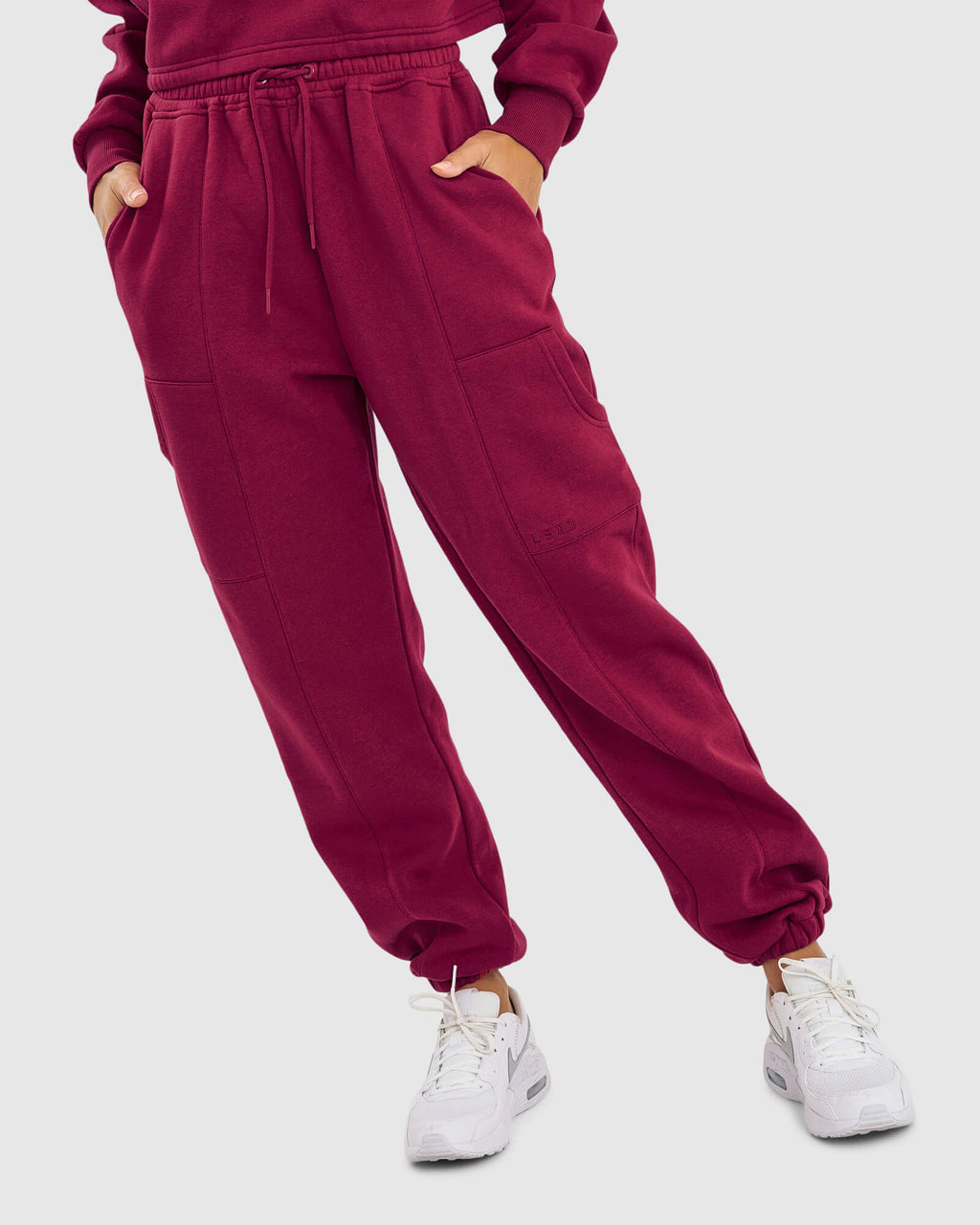 Model wearing Harley Track Pant - Candy Apple