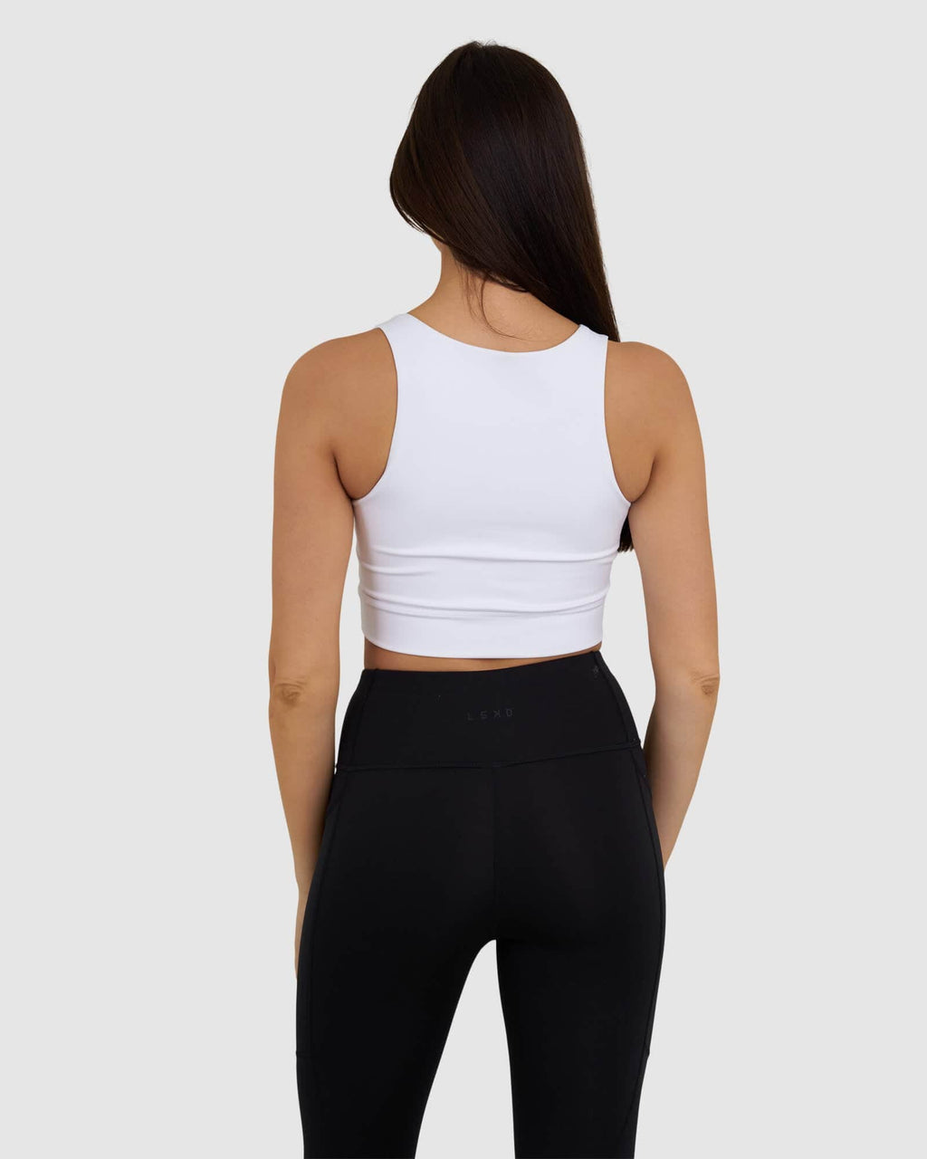 Model wearing Zip Up Tank - White