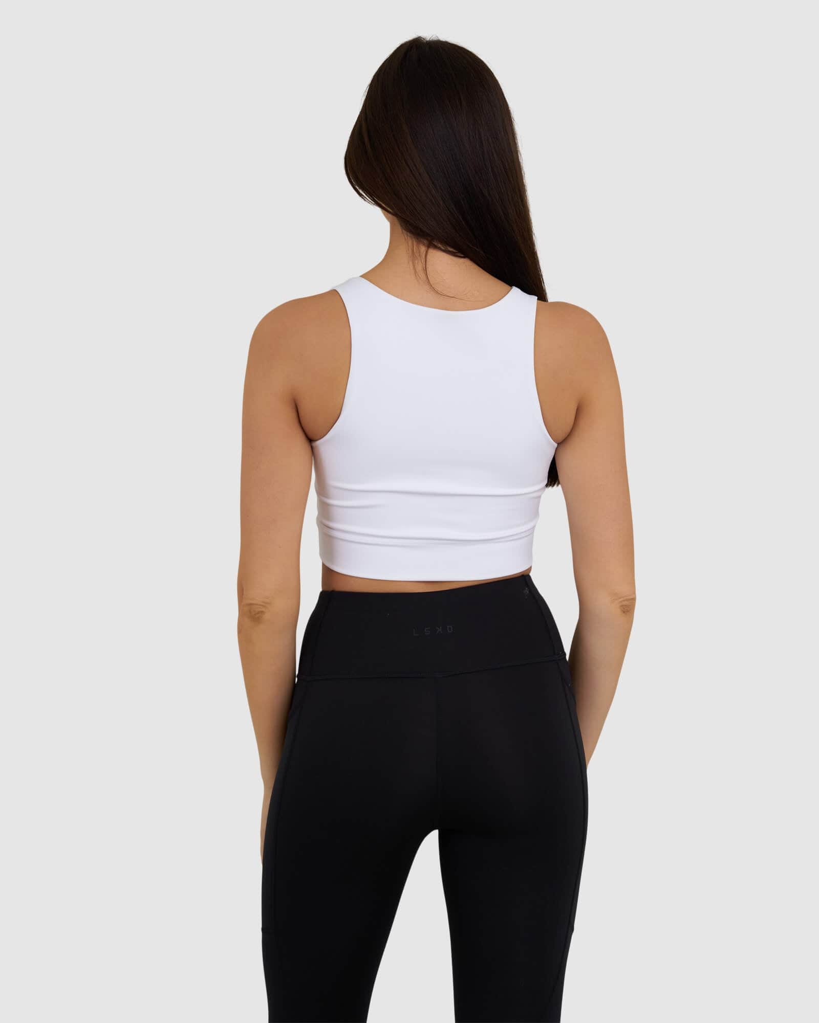 Model wearing Zip Up Tank - White