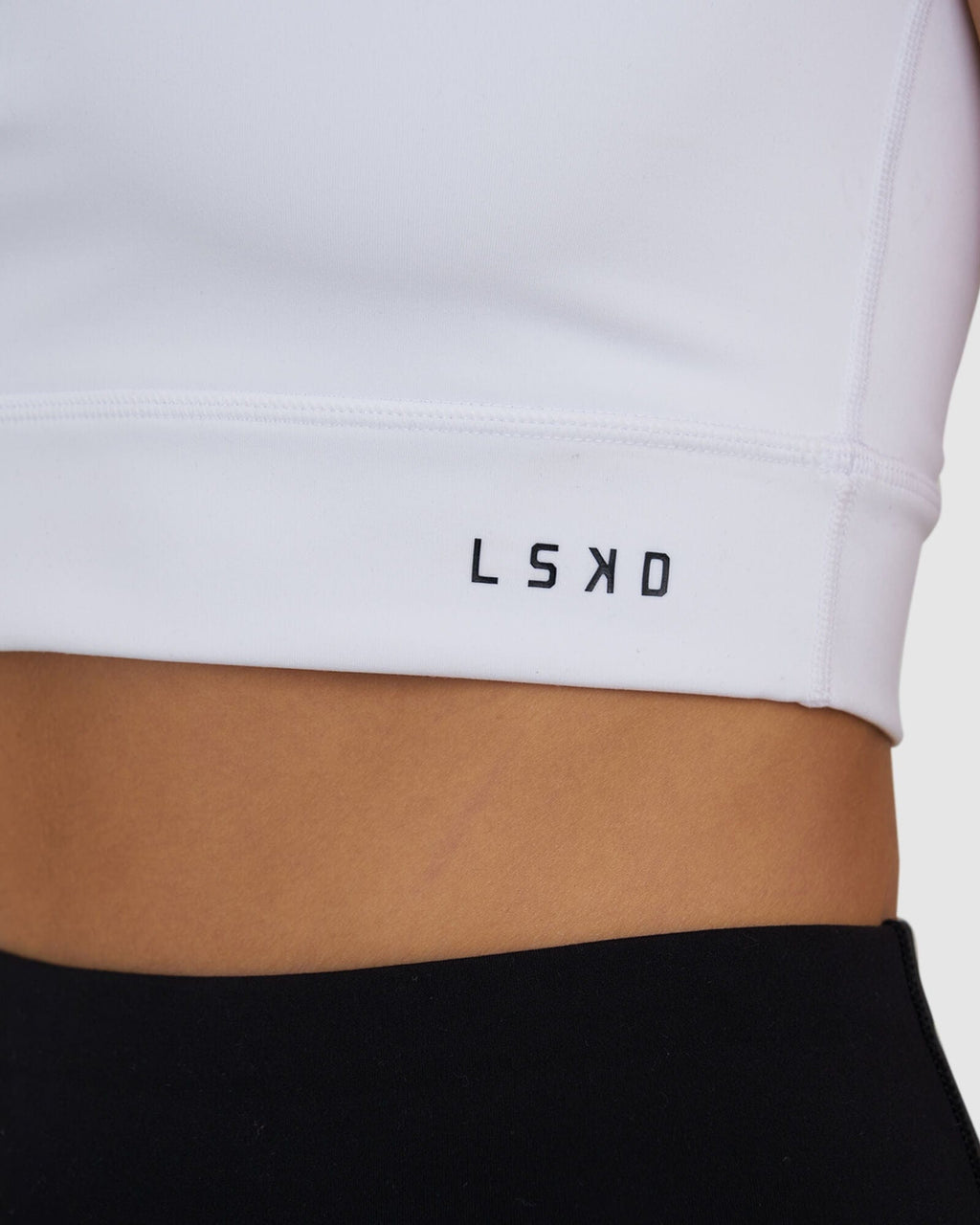 Model wearing Zip Up Tank - White