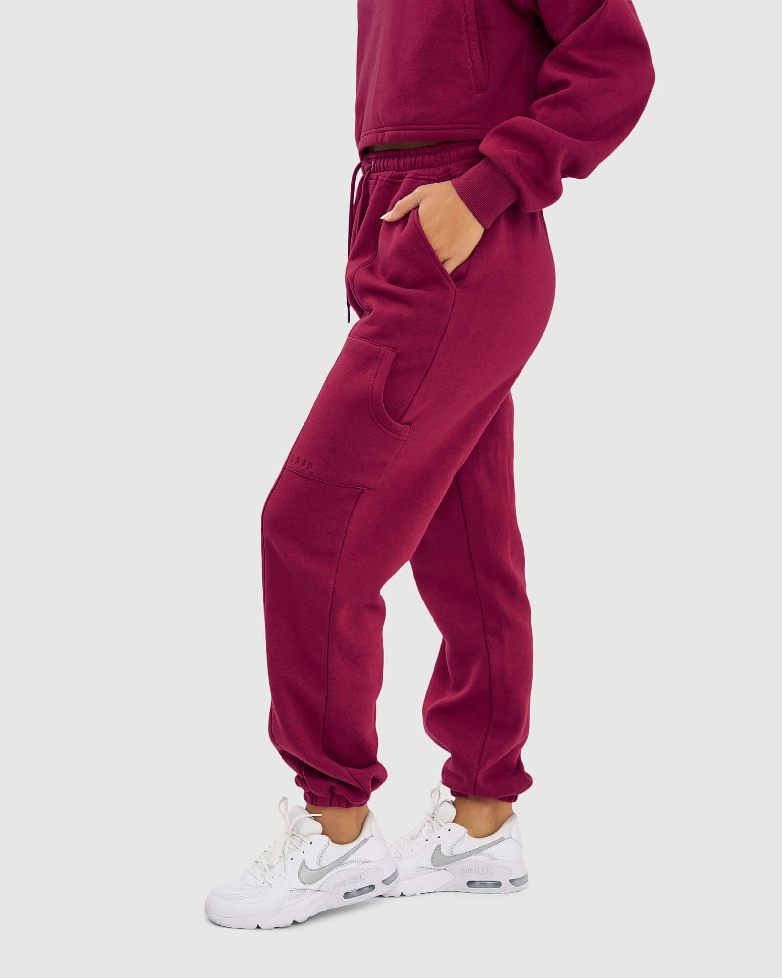 Model wearing Harley Track Pant - Candy Apple