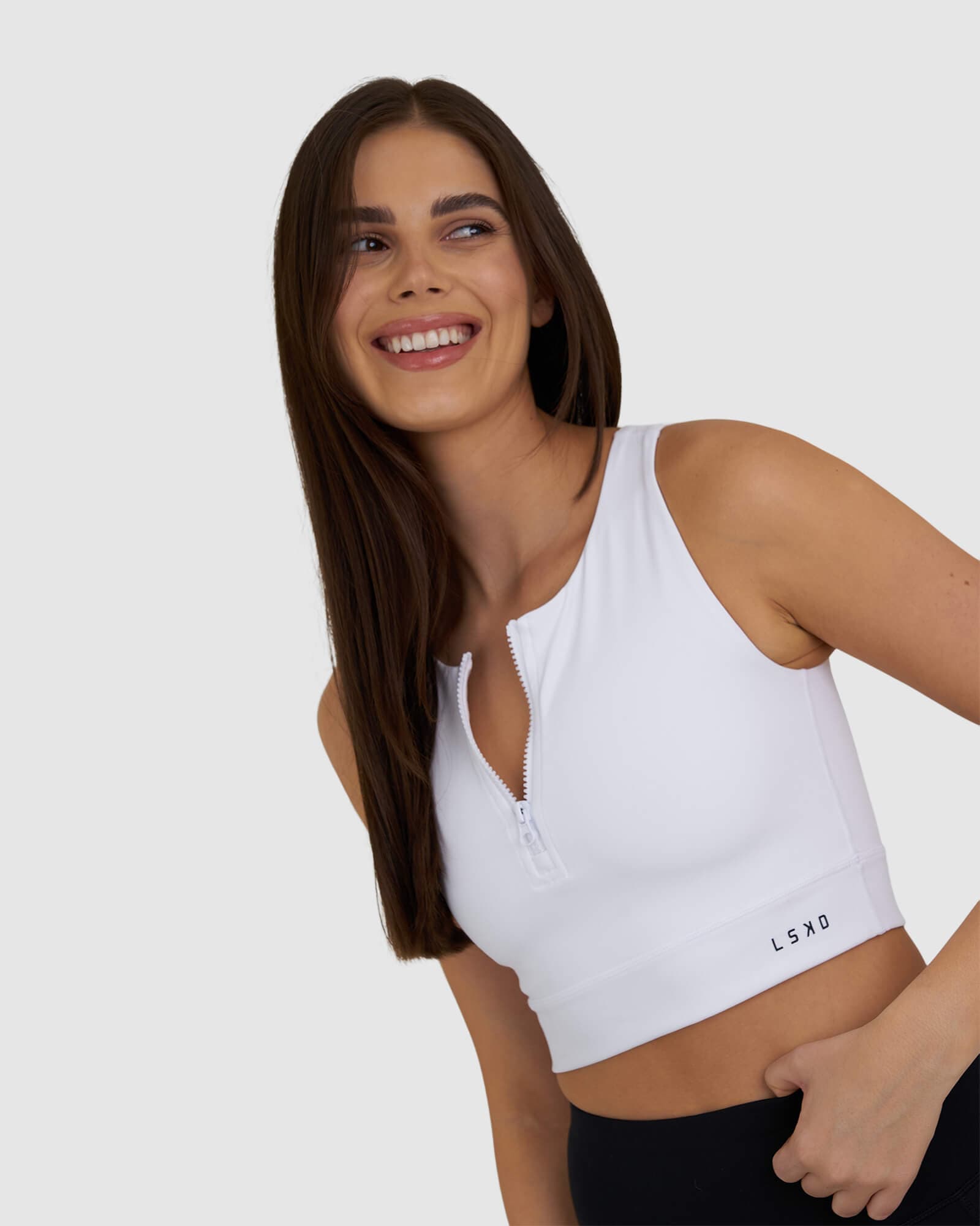 Model wearing Zip Up Tank - White