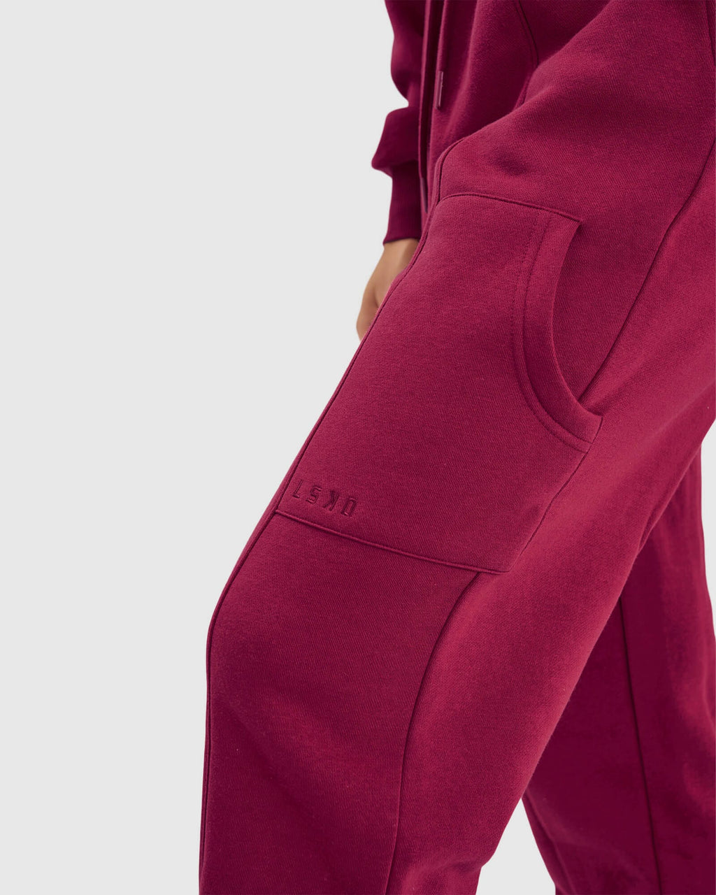 Model wearing Harley Track Pant - Candy Apple