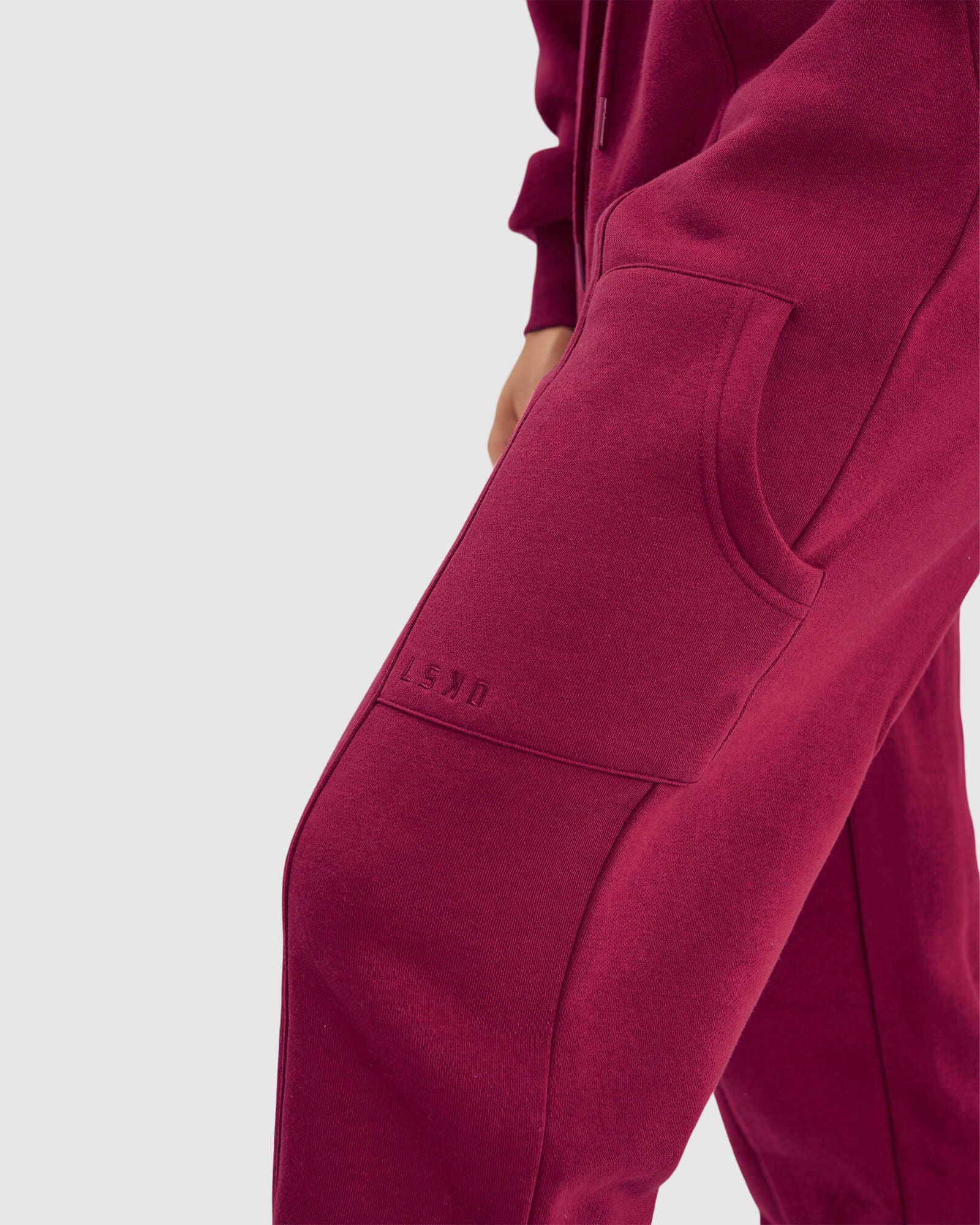 Model wearing Harley Track Pant - Candy Apple