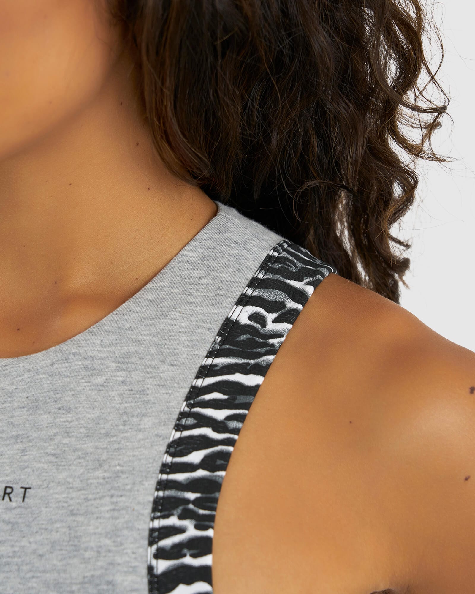 Model wearing Run Tank - Lt Grey Marl