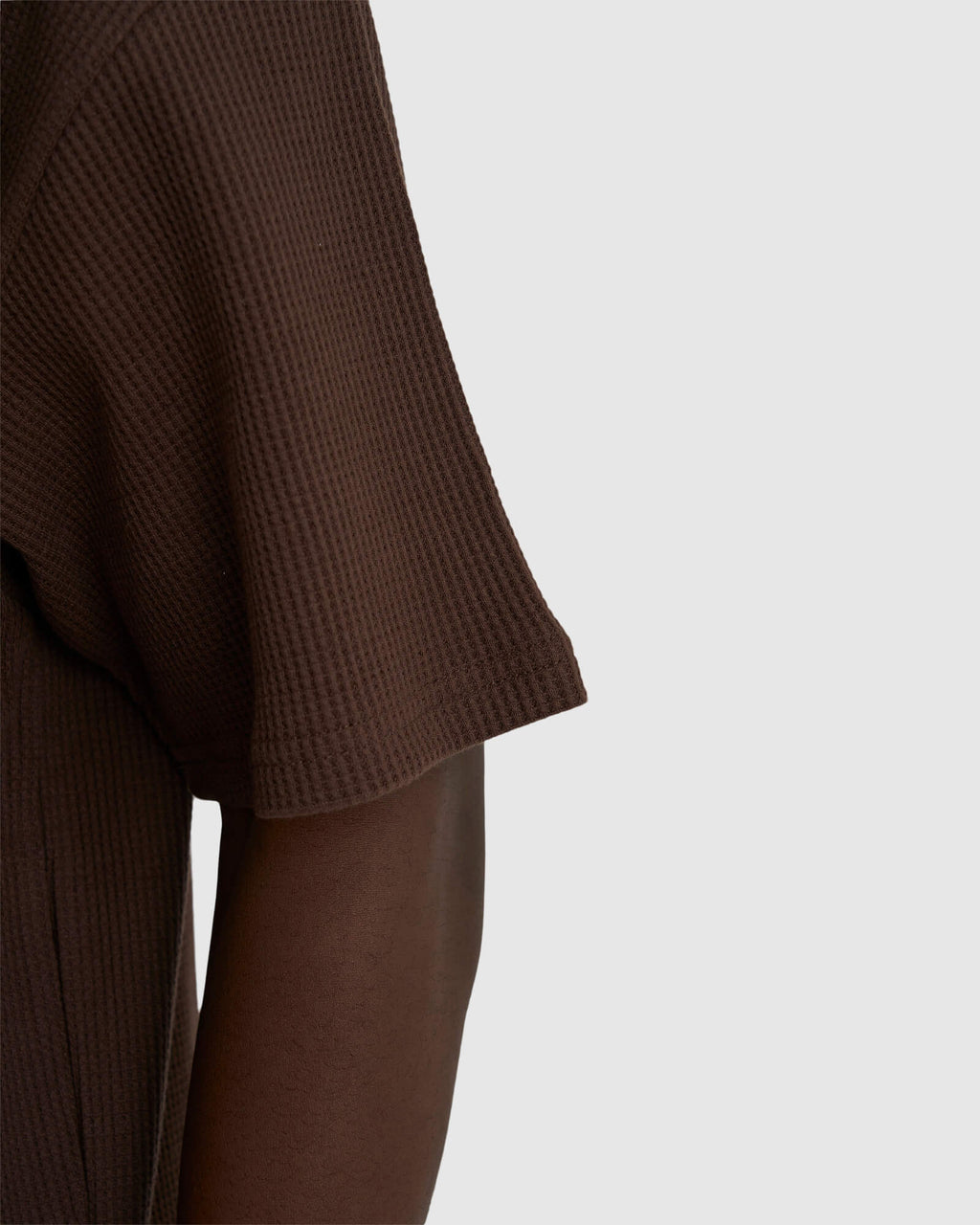 Model wearing Unisex Verse Waffle Tee - Walnut