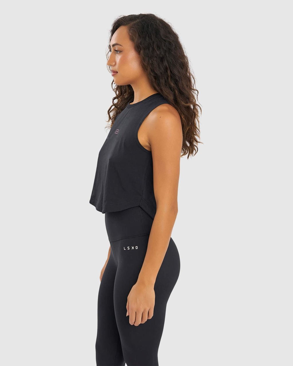 Model wearing Lotus Tank - Black-Boysenberry