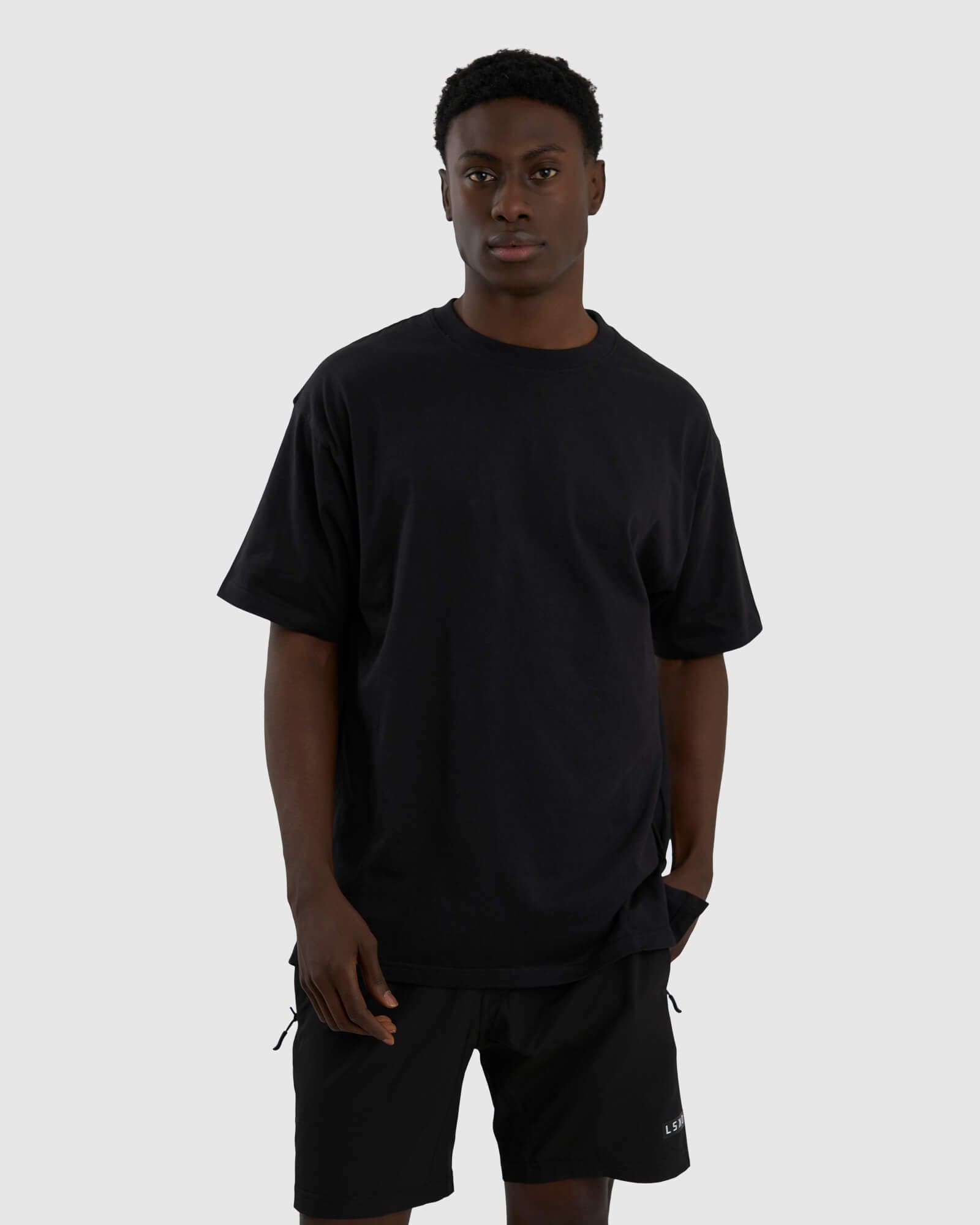 Model wearing Span Tee Oversize - Black