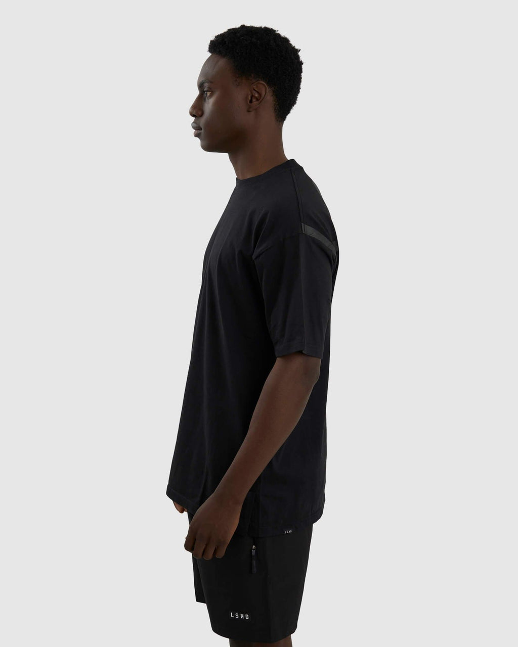 Model wearing Span Tee Oversize - Black