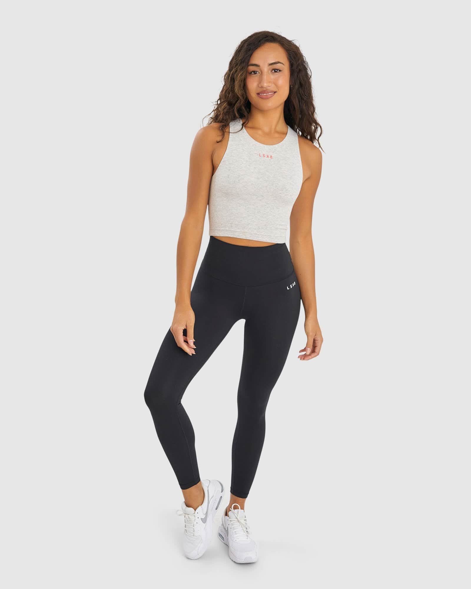 Model wearing Status Tank - Lt Grey Marl- Fruit Punch