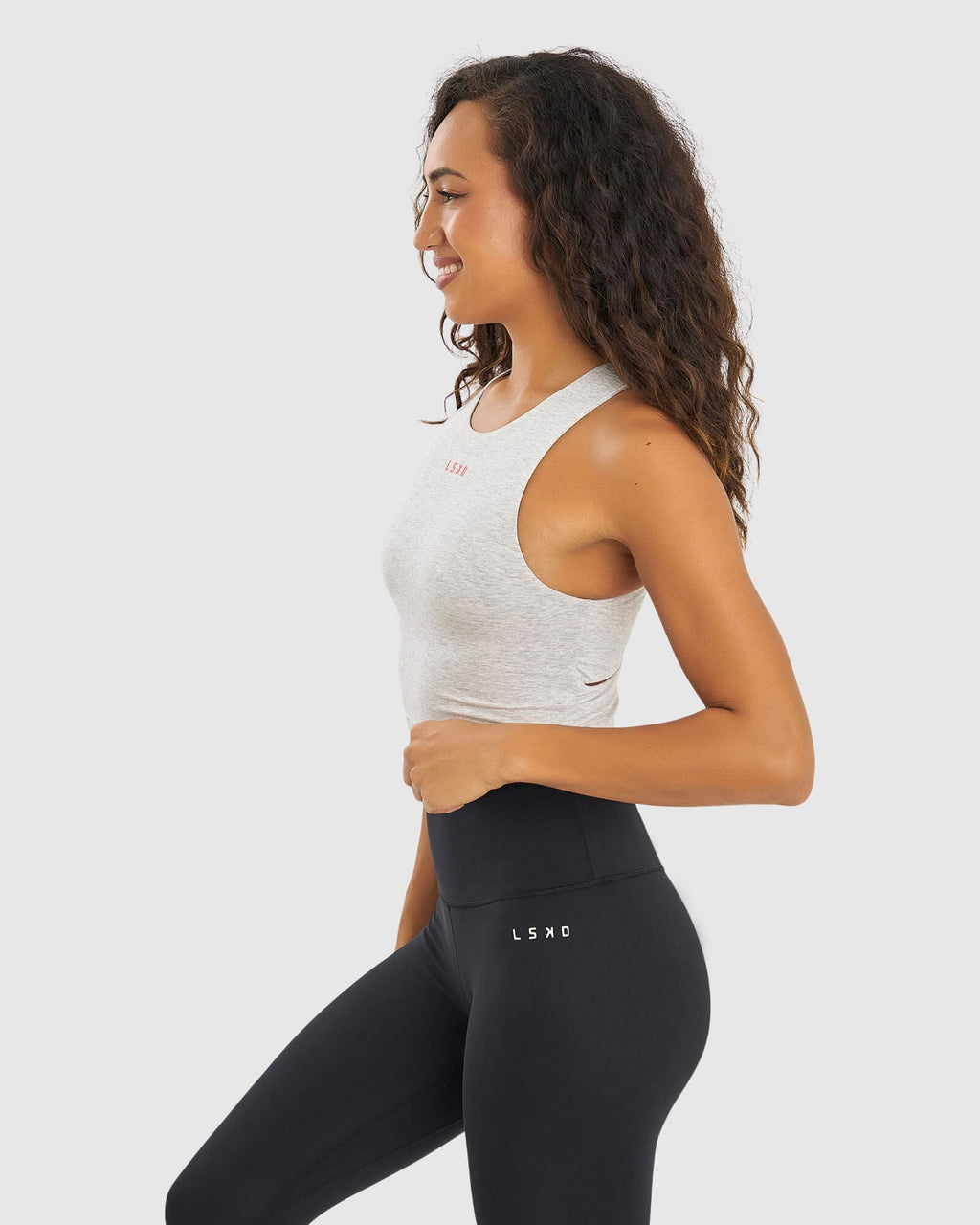 Model wearing Status Tank - Lt Grey Marl- Fruit Punch