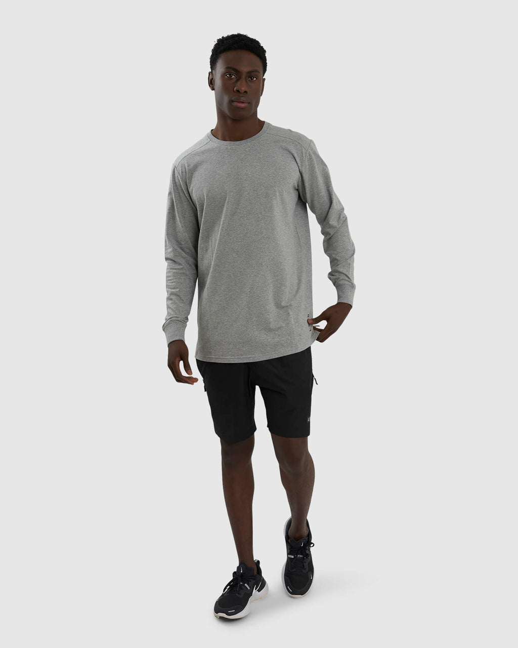 Model wearing Tab LS Tee - Lt Grey Marl