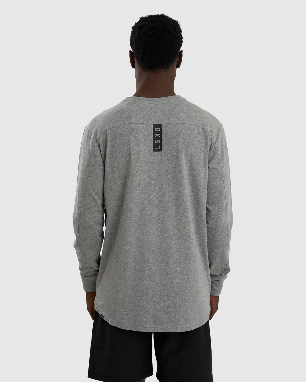 Model wearing Tab LS Tee - Lt Grey Marl