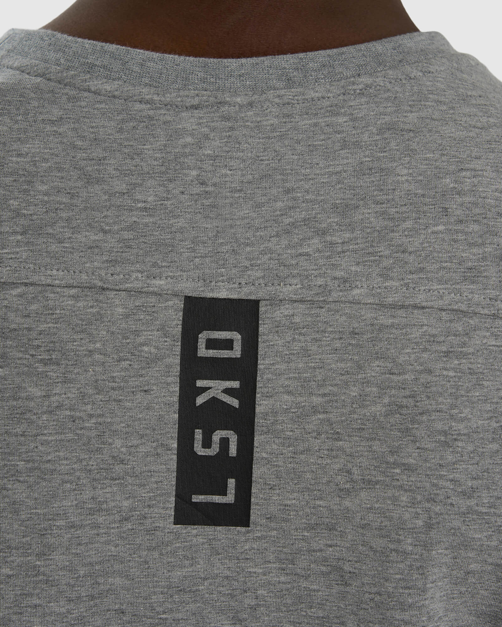 Model wearing Tab LS Tee - Lt Grey Marl