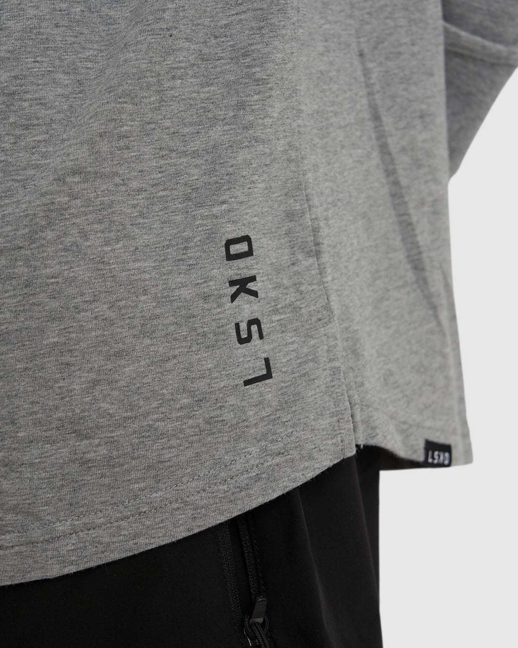 Model wearing Tab LS Tee - Lt Grey Marl