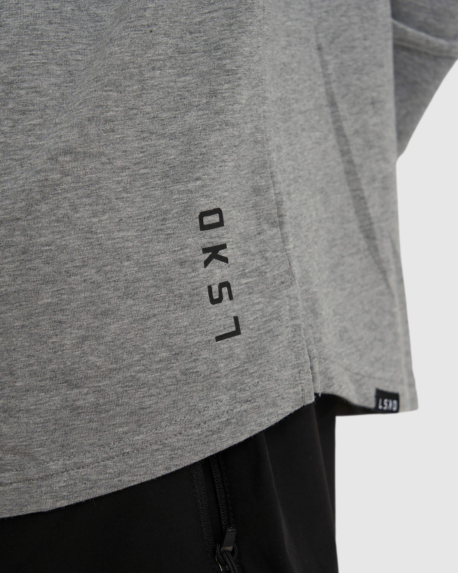 Model wearing Tab LS Tee - Lt Grey Marl