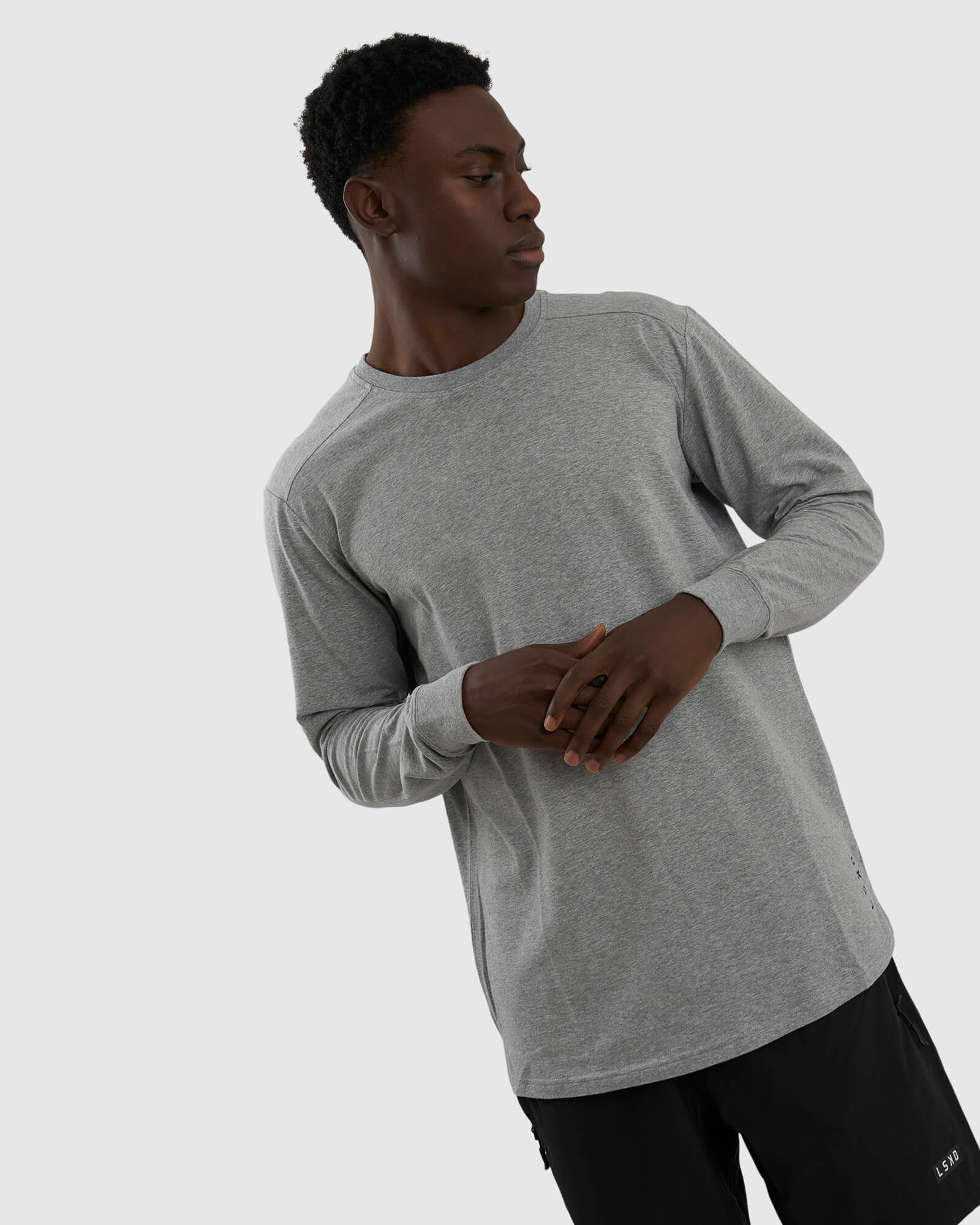 Model wearing Tab LS Tee - Lt Grey Marl