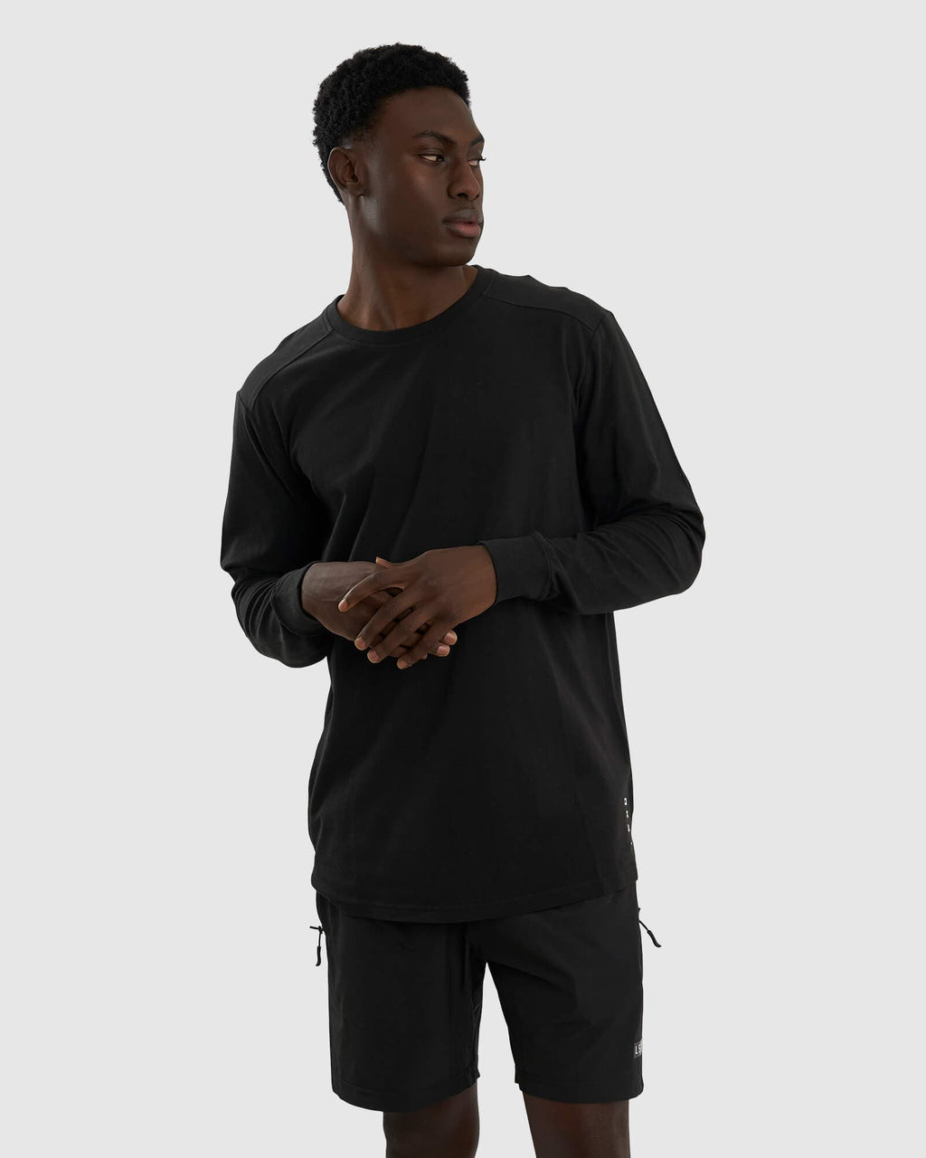 Model wearing Tab LS Tee - Black