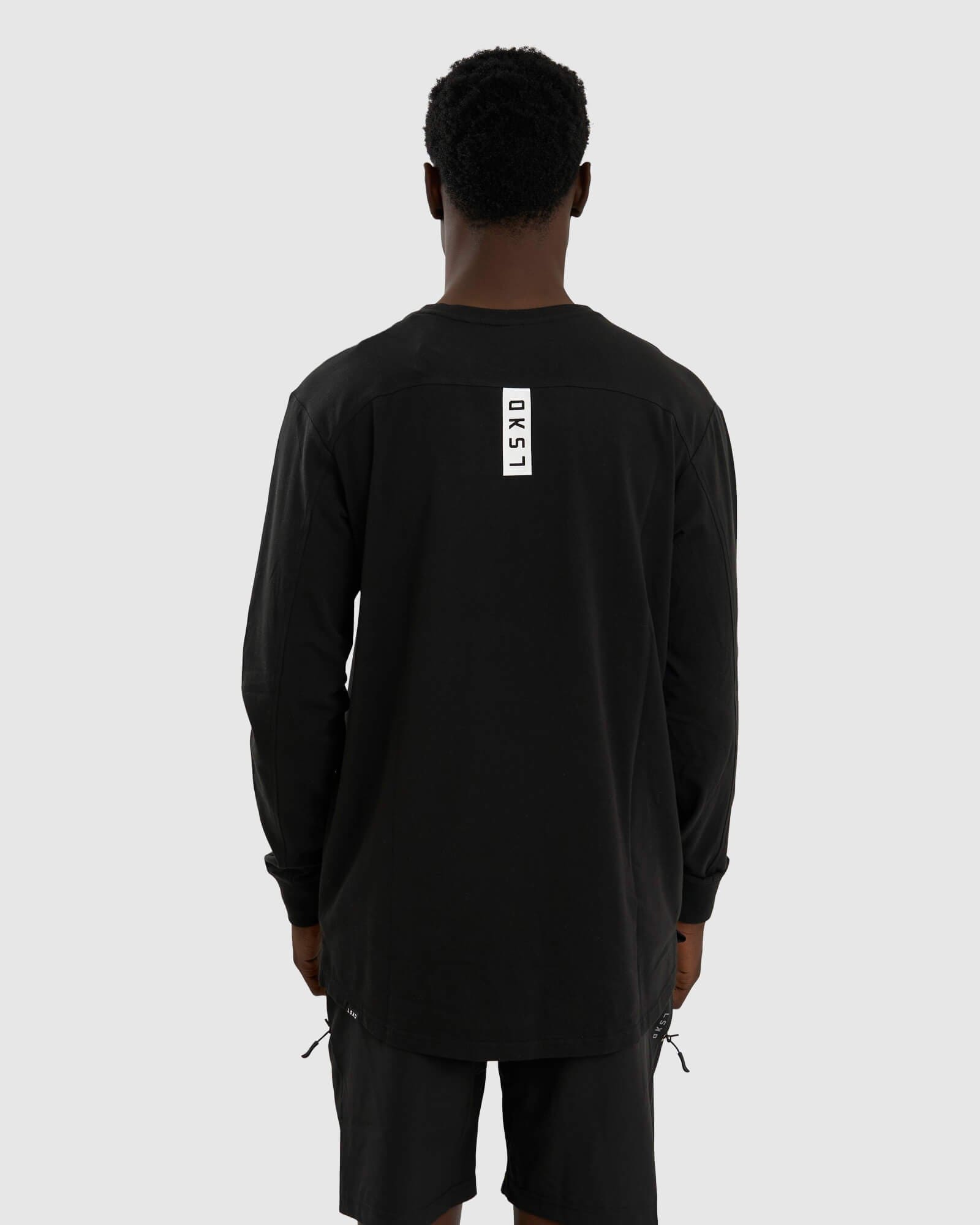 Model wearing Tab LS Tee - Black