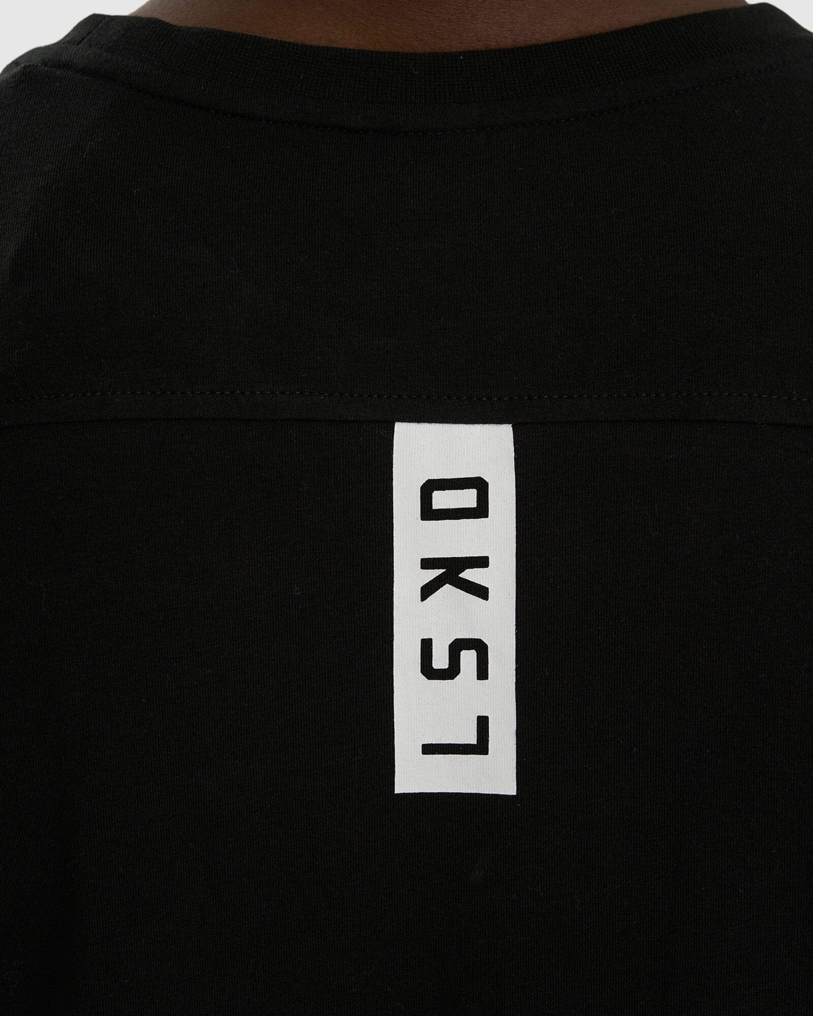 Model wearing Tab LS Tee - Black