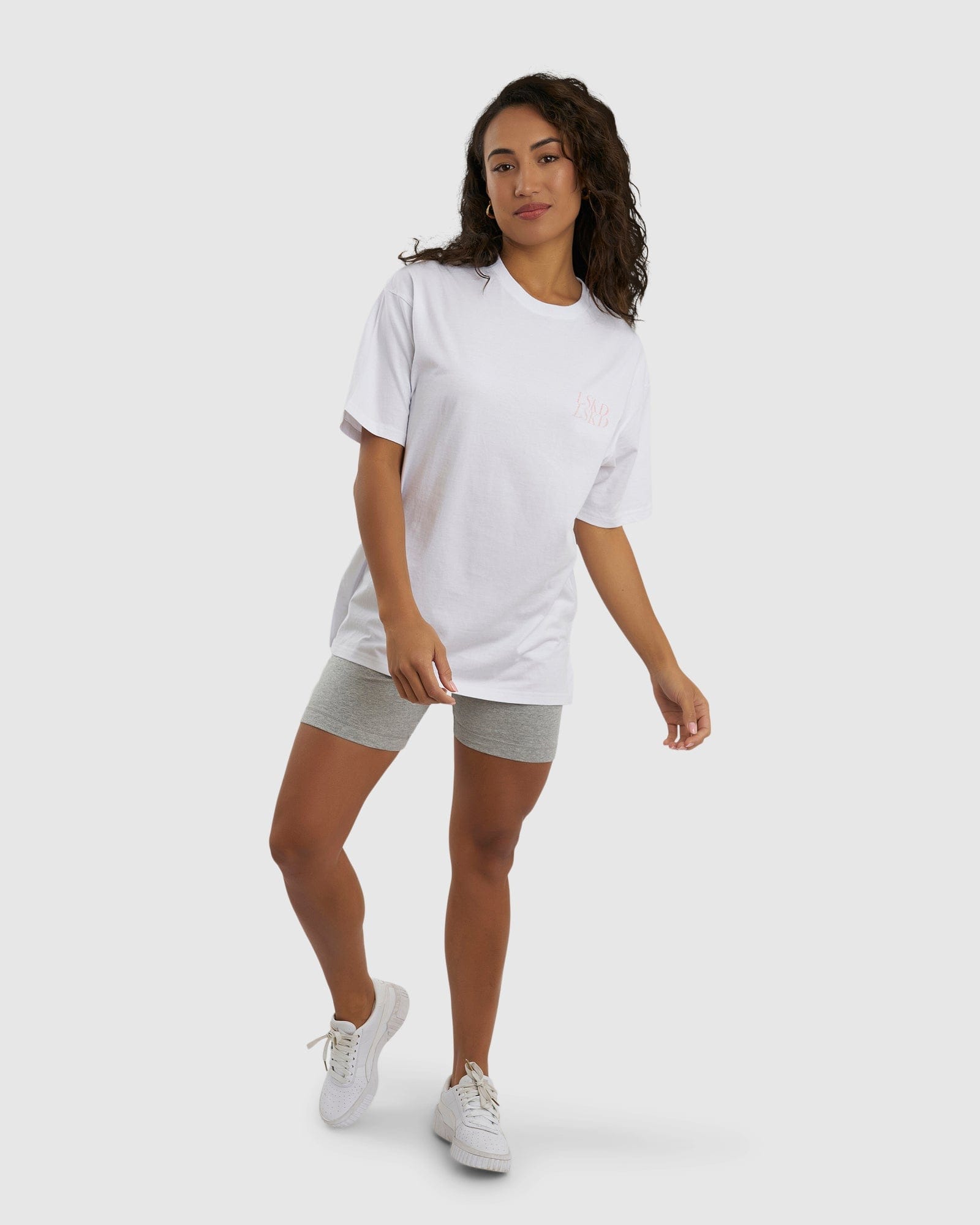 Model wearing Unisex Aurora Tee Oversized - White