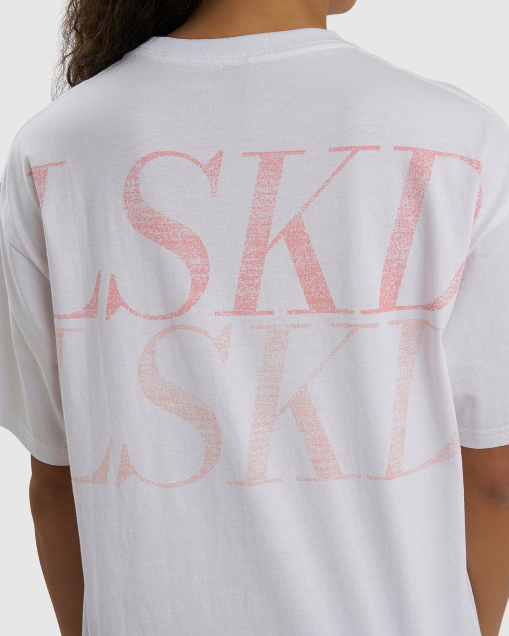 Model wearing Unisex Aurora Tee Oversized - White