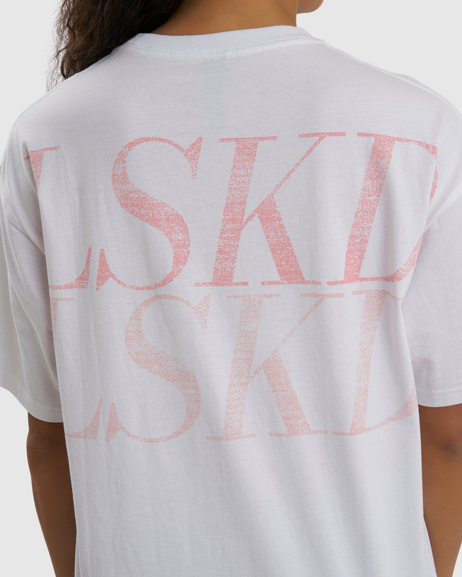 Model wearing Unisex Aurora Tee Oversized - White