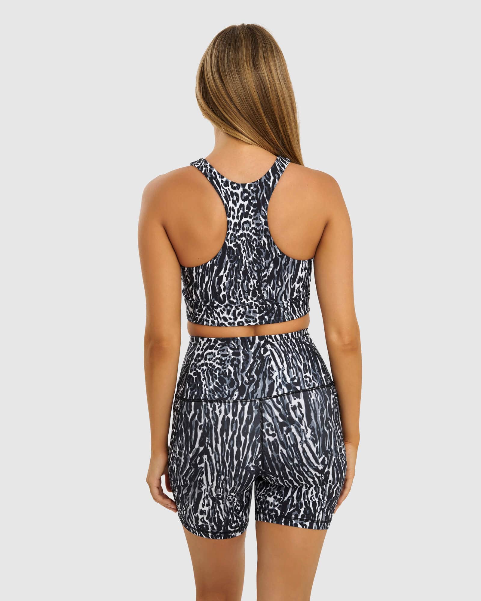 Model wearing Reformer Sport Tank - Night Leopard