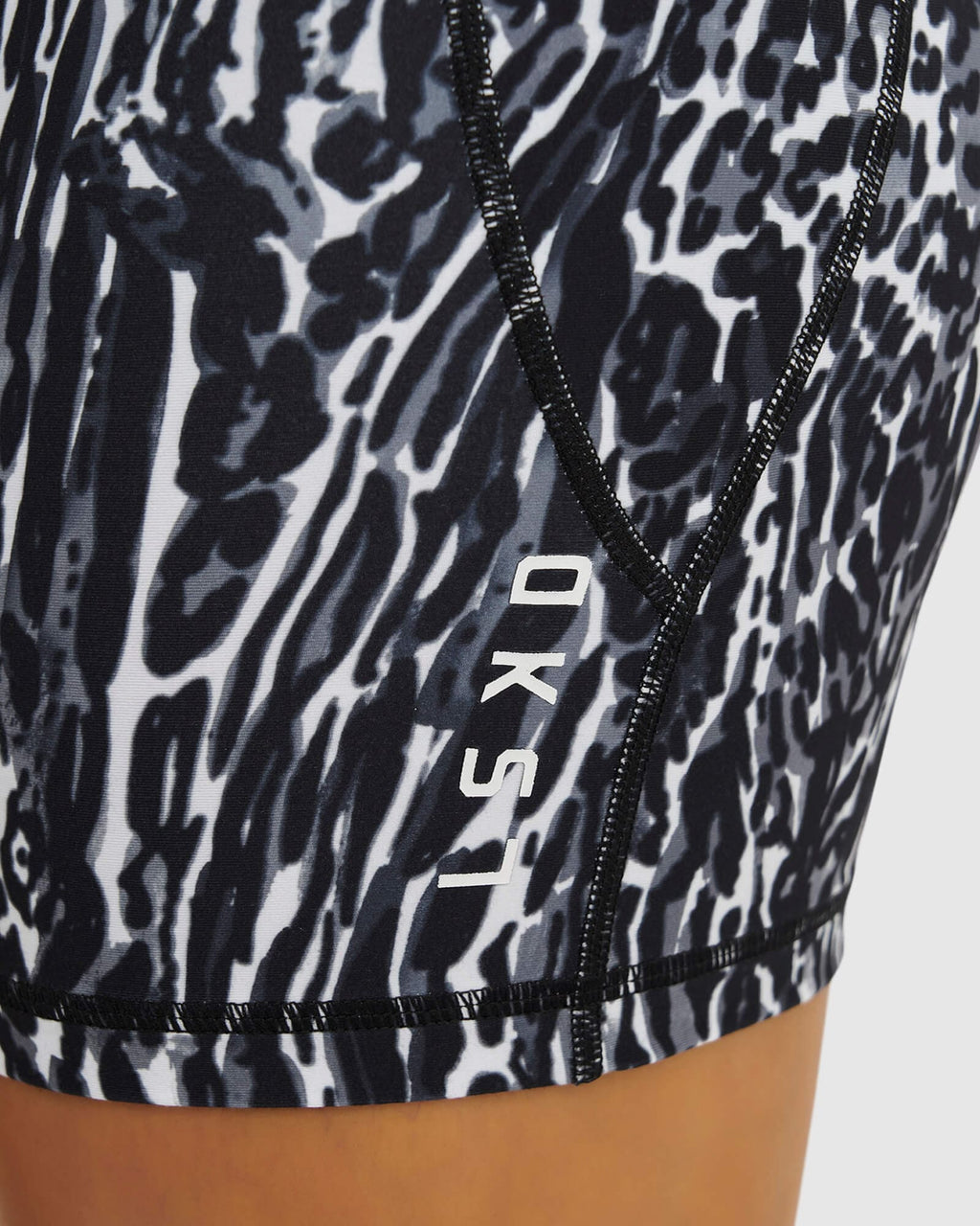 Model wearing Flux Mid Short Tight Slimline Elastic Waistband - Night Leopard