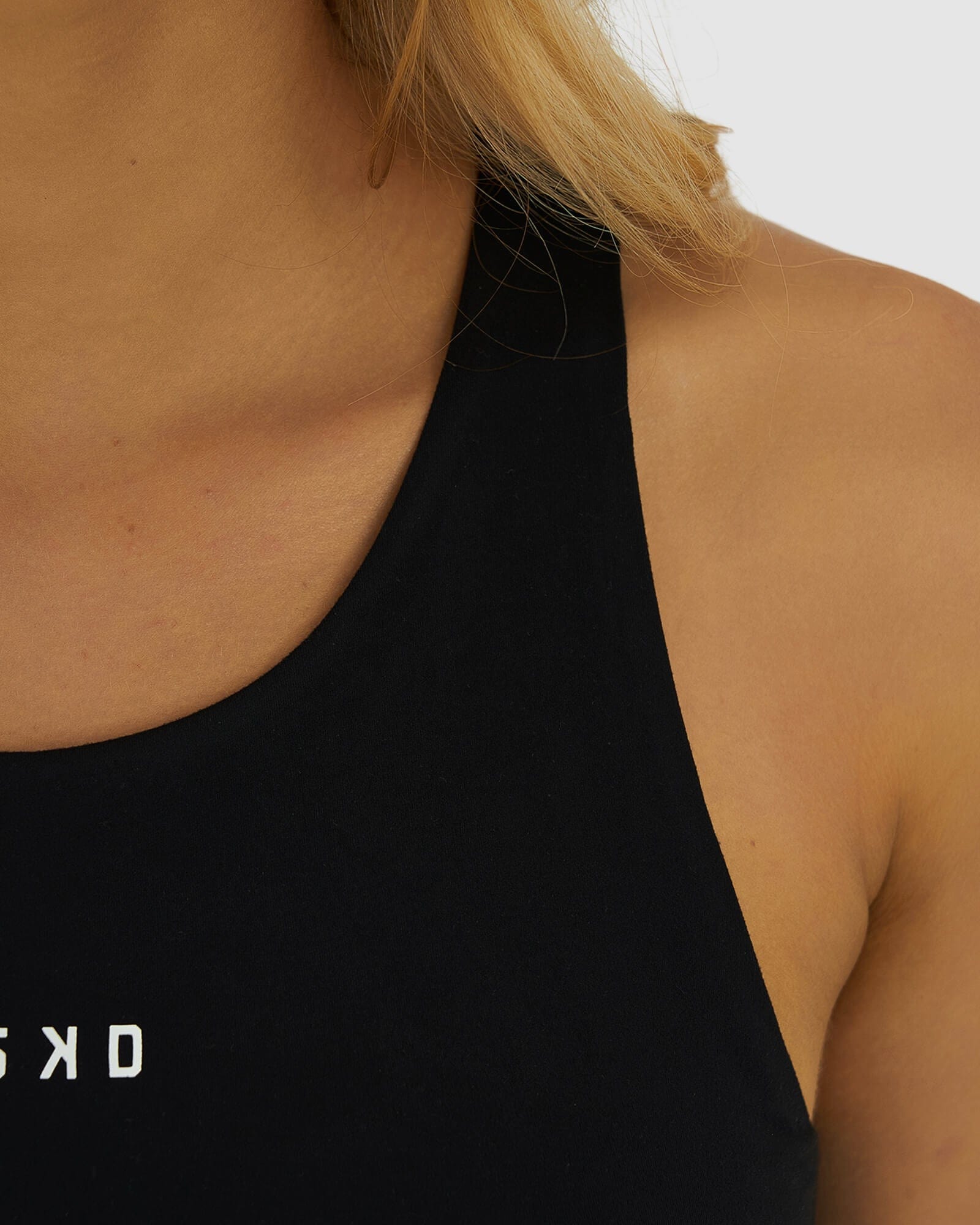 Model wearing Base Crop Tank - Black