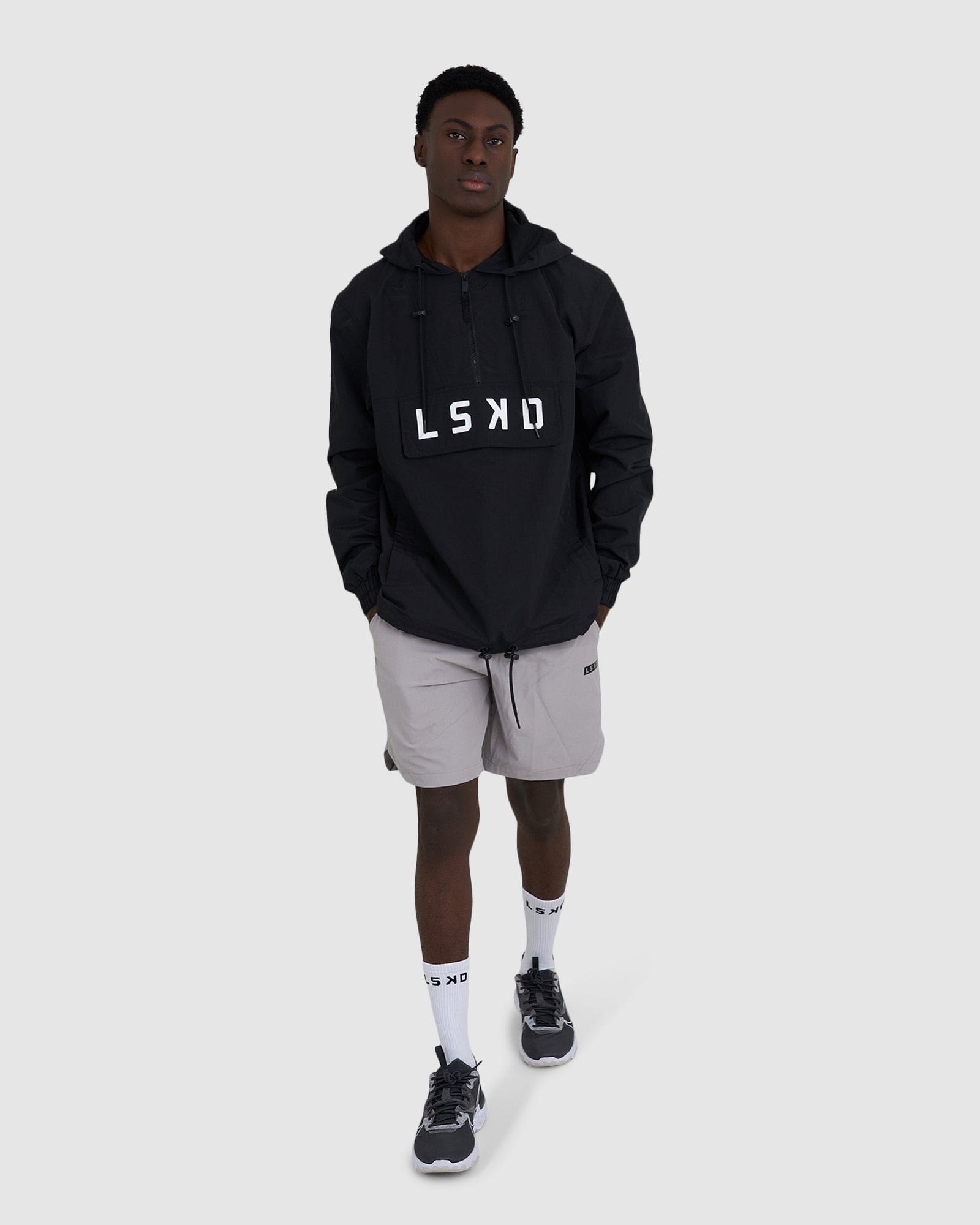 Model wearing Burrell Track Jacket - Black