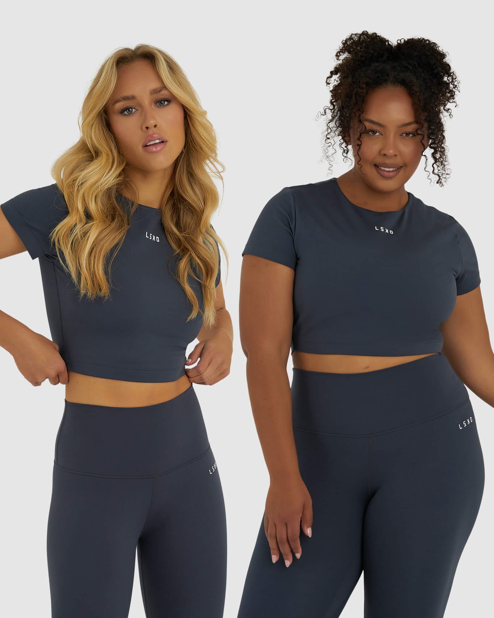 Model wearing Base Crop Tee - Ink