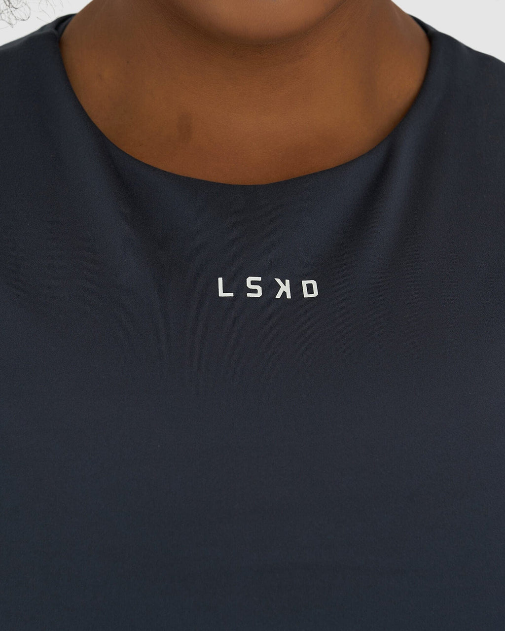 Model wearing Base Crop Tee - Ink