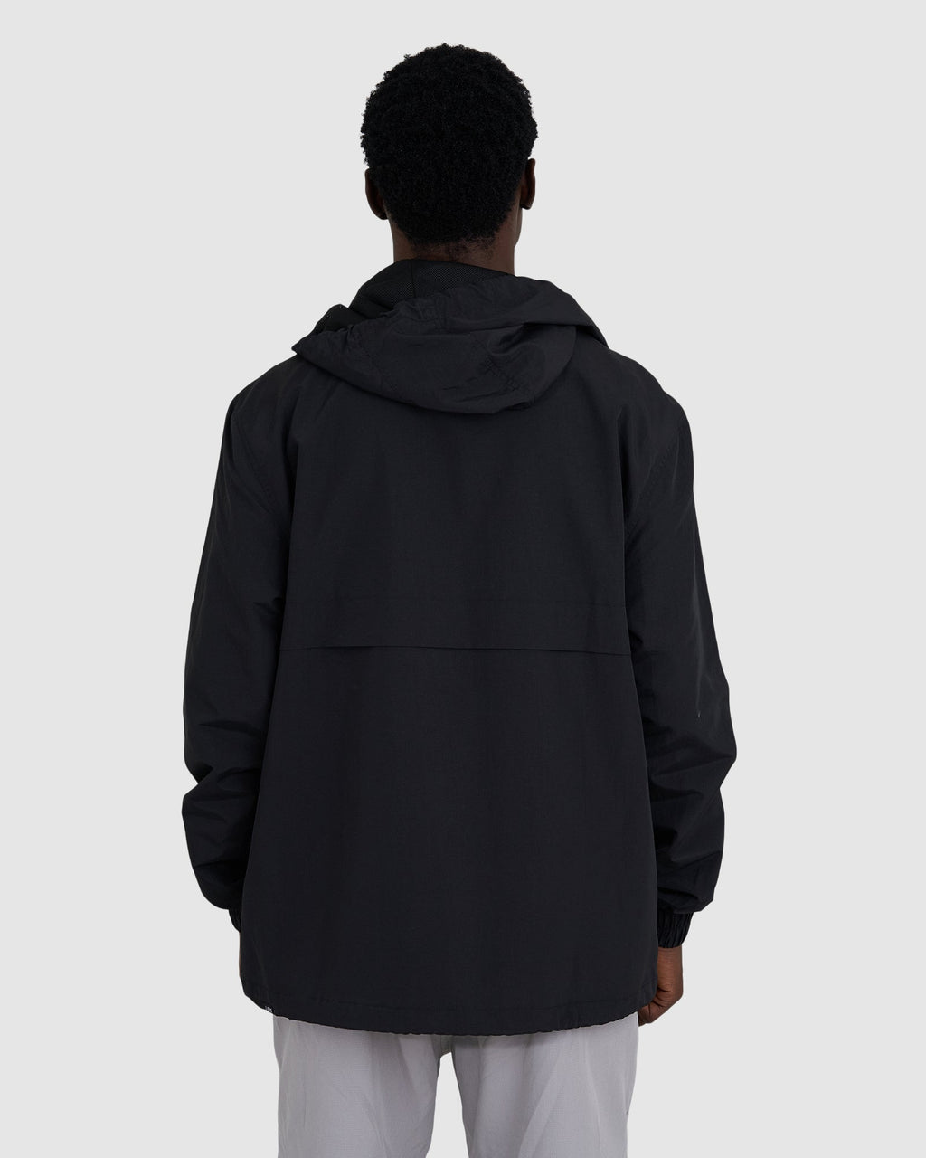 Model wearing Burrell Track Jacket - Black