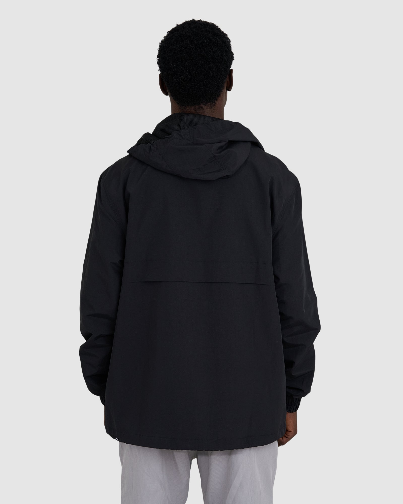 Model wearing Burrell Track Jacket - Black