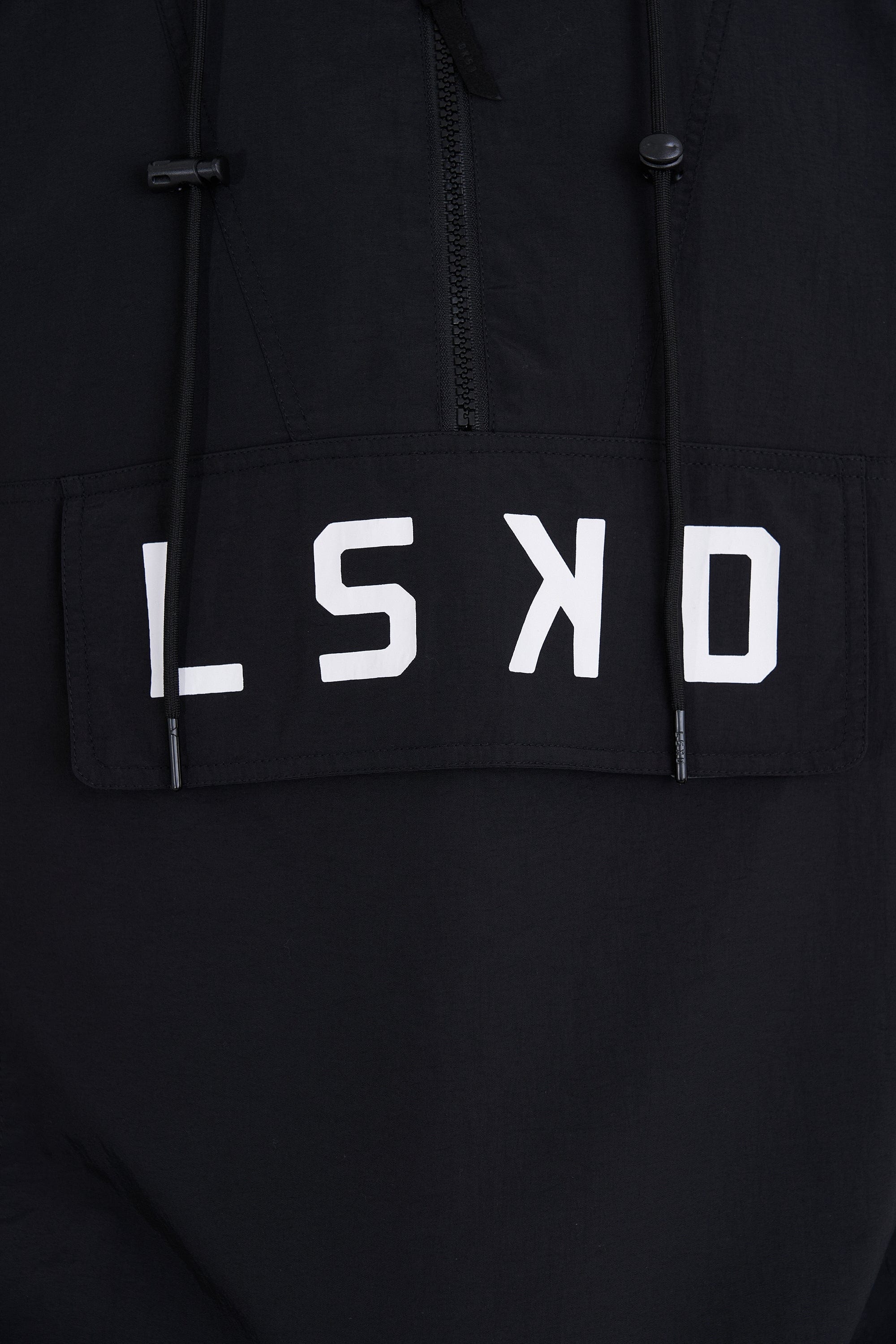 Model wearing Burrell Track Jacket - Black