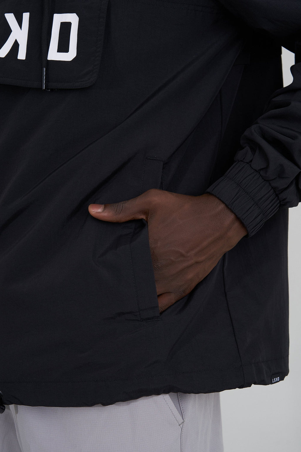 Model wearing Burrell Track Jacket - Black