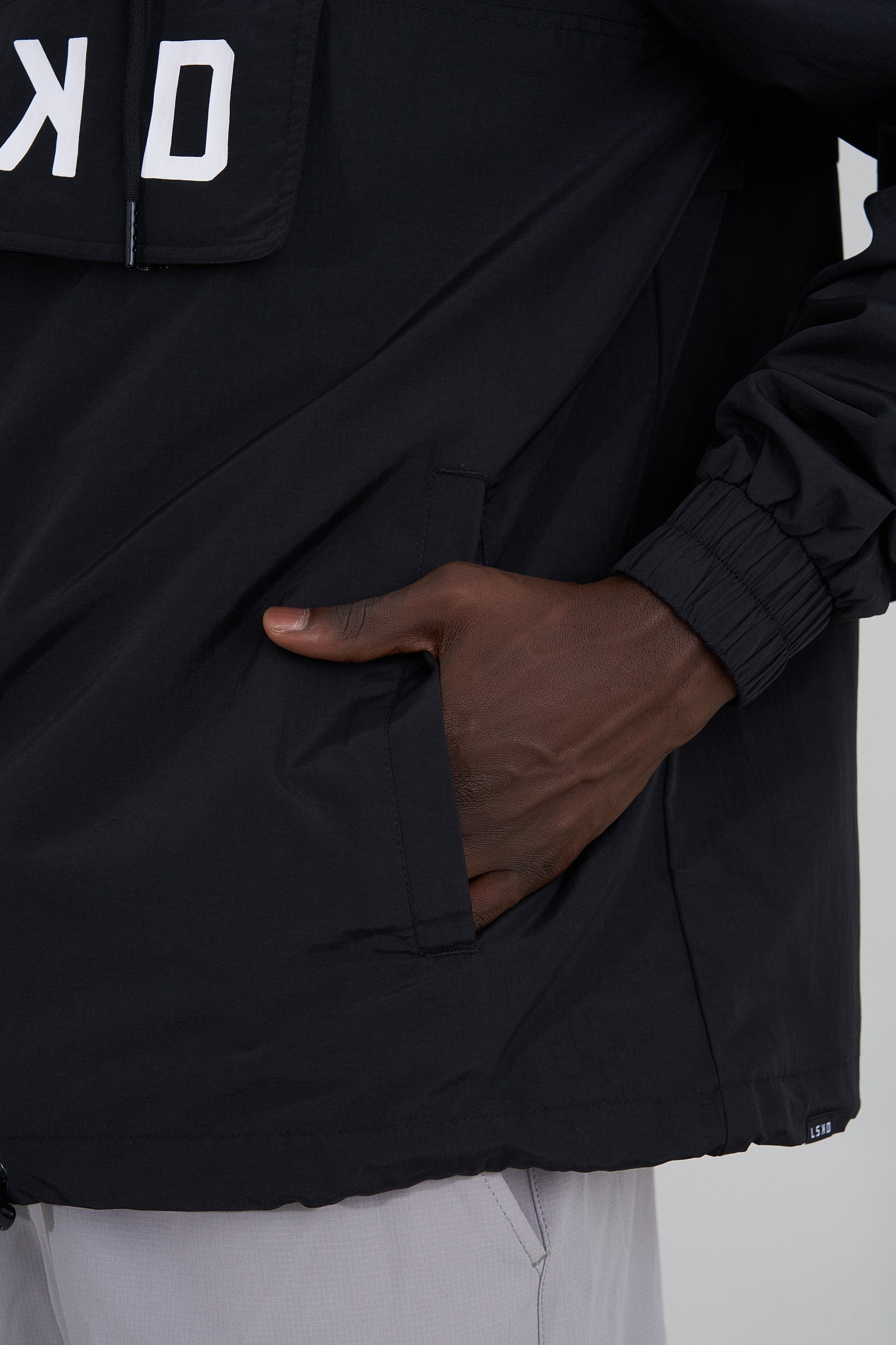 Model wearing Burrell Track Jacket - Black