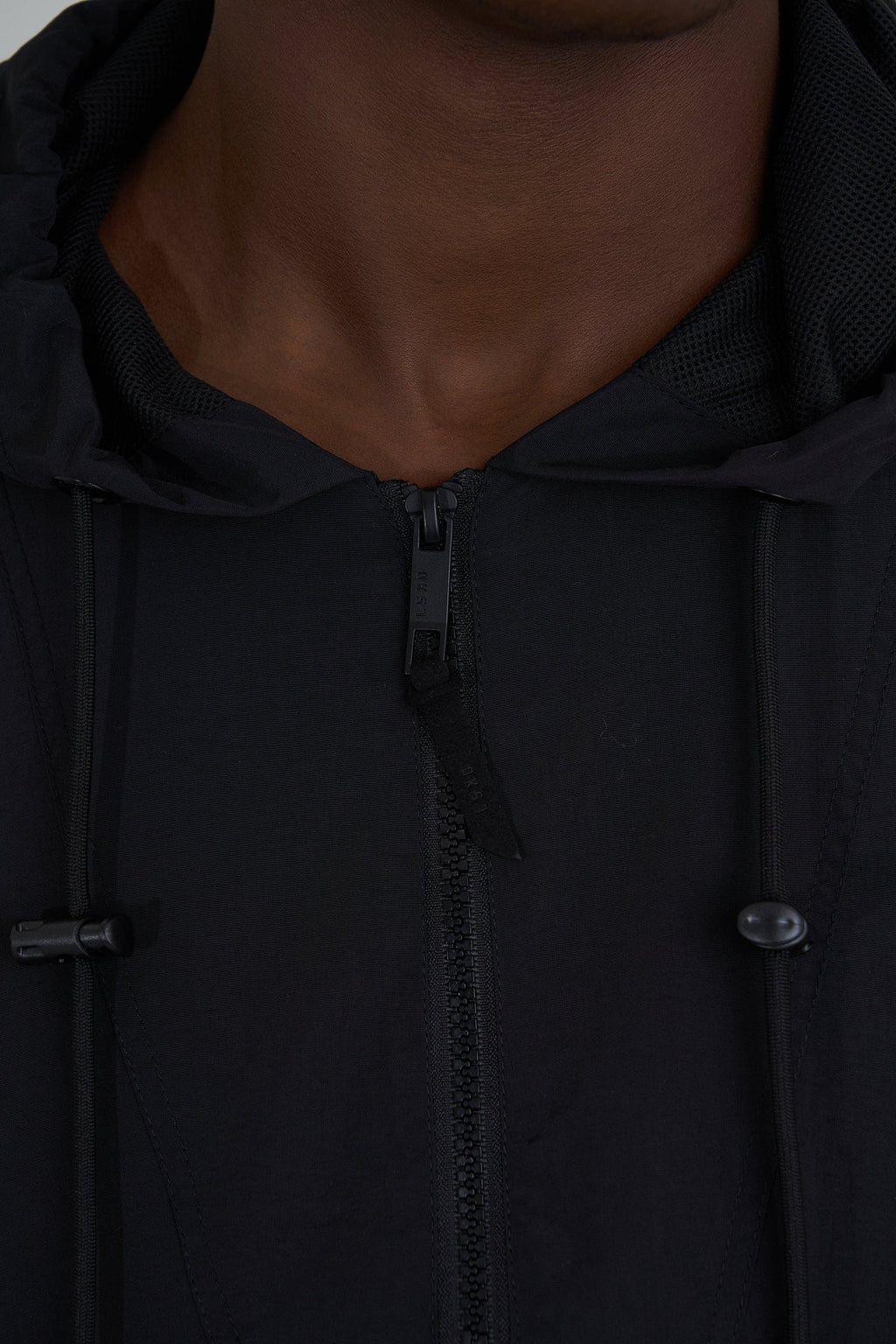 Model wearing Burrell Track Jacket - Black