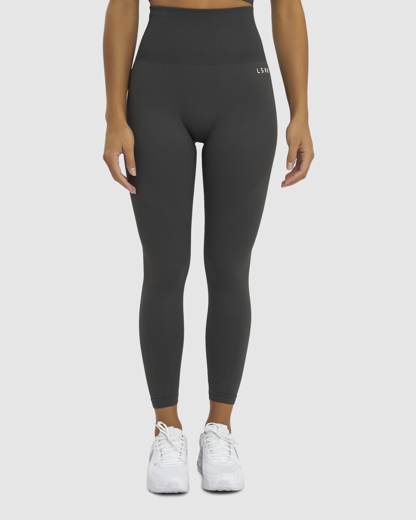 Model wearing Limitless Seamless 7/8 Length Tights - Charcoal