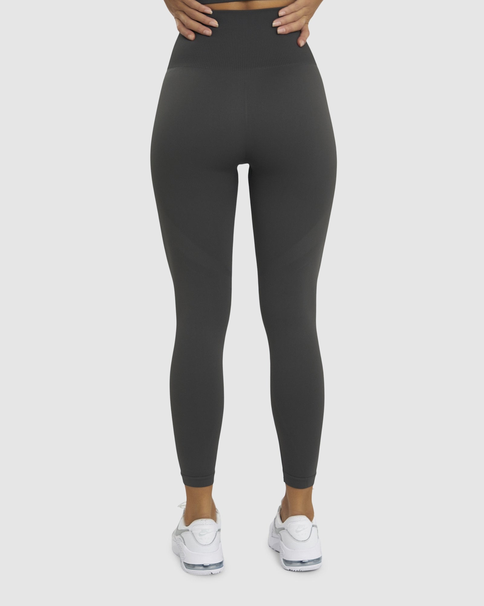 Model wearing Limitless Seamless 7/8 Length Tights - Charcoal