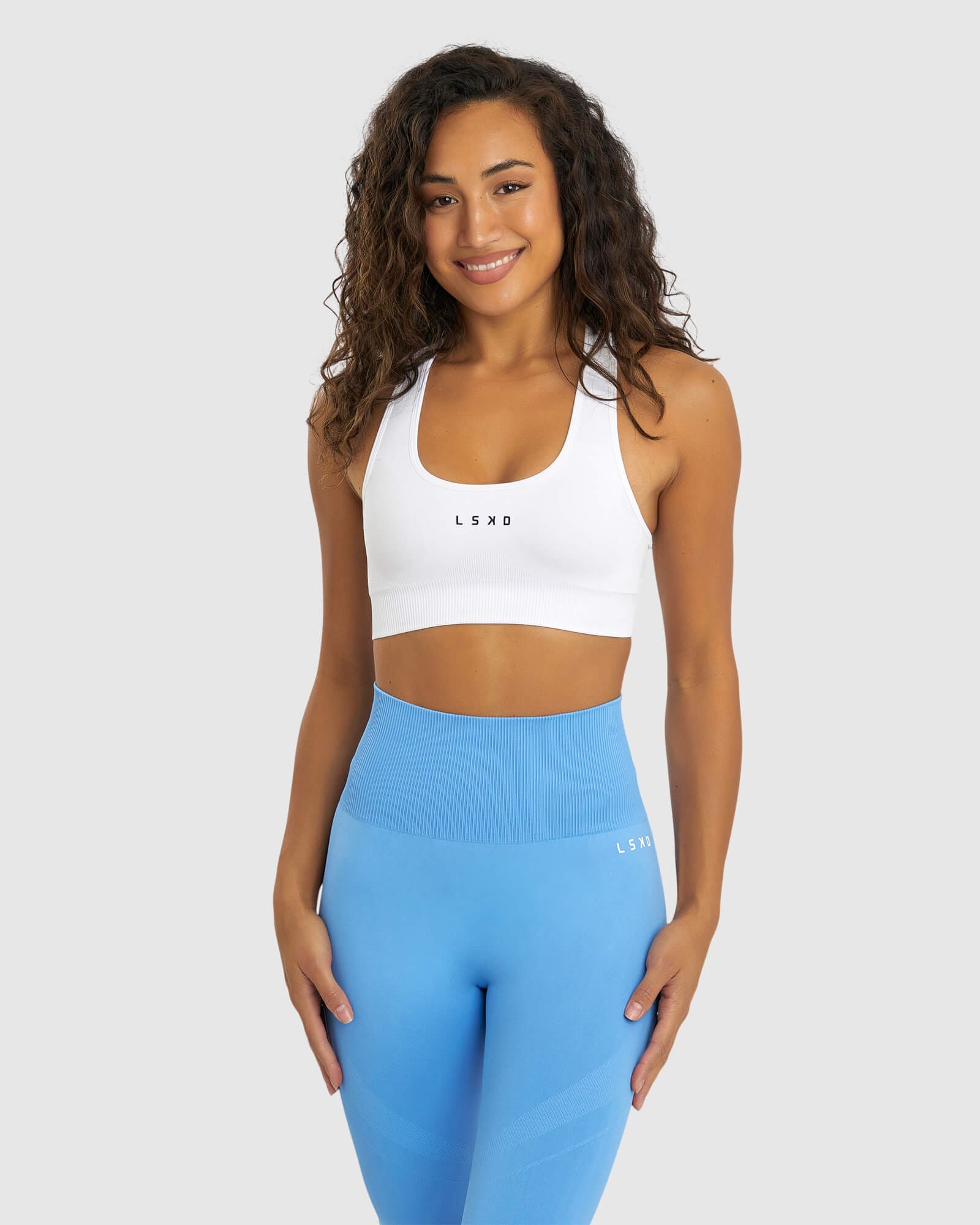 Model wearing Limitless Seamless Sports Bra - White
