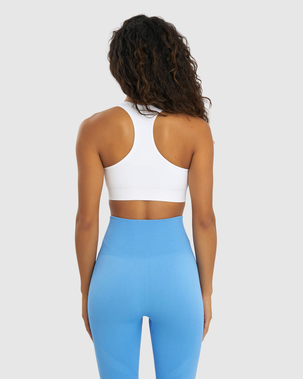 Model wearing Limitless Seamless Sports Bra - White