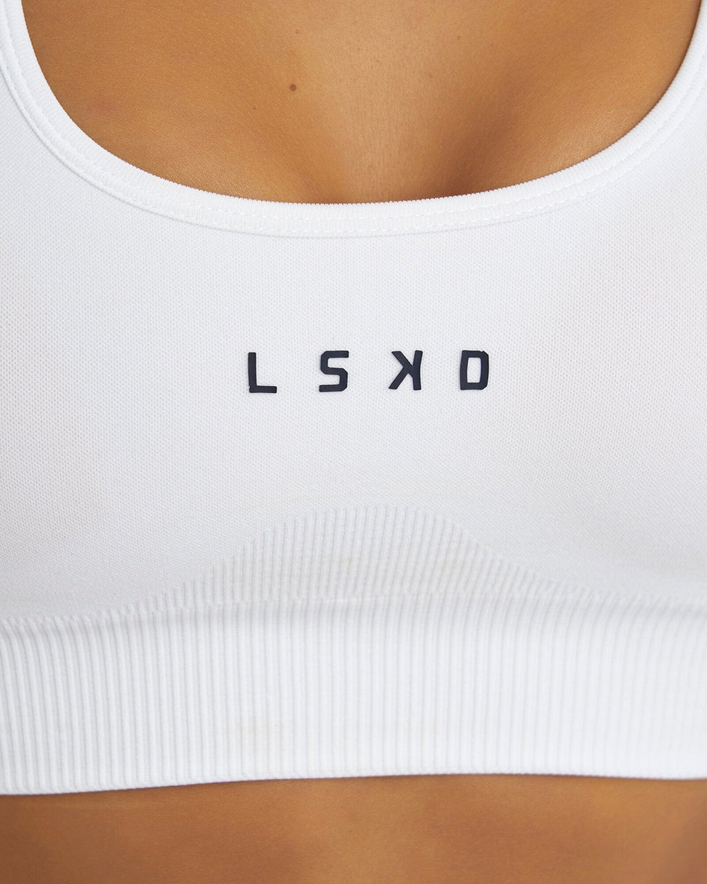 Model wearing Limitless Seamless Sports Bra - White