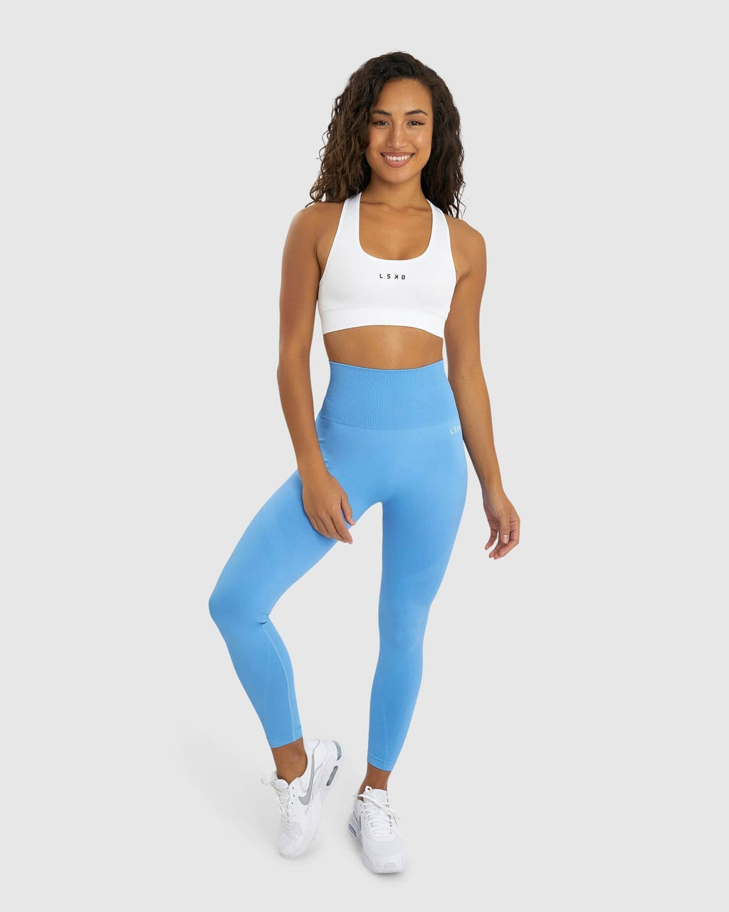 Model wearing Limitless Seamless Sports Bra - White