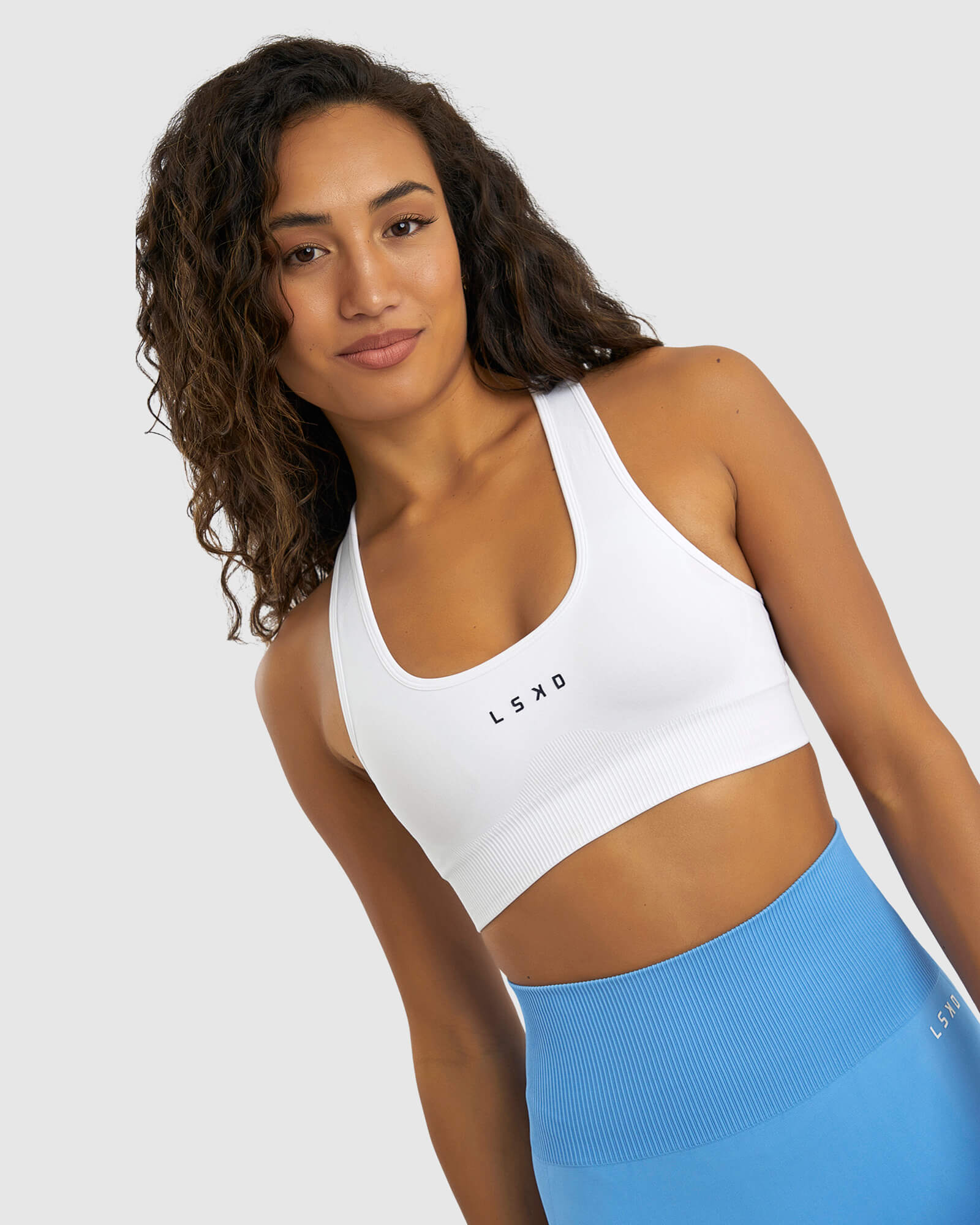 Model wearing Limitless Seamless Sports Bra - White
