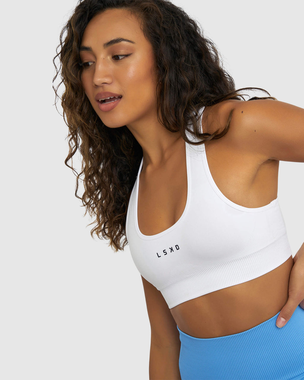 Model wearing Limitless Seamless Sports Bra - White