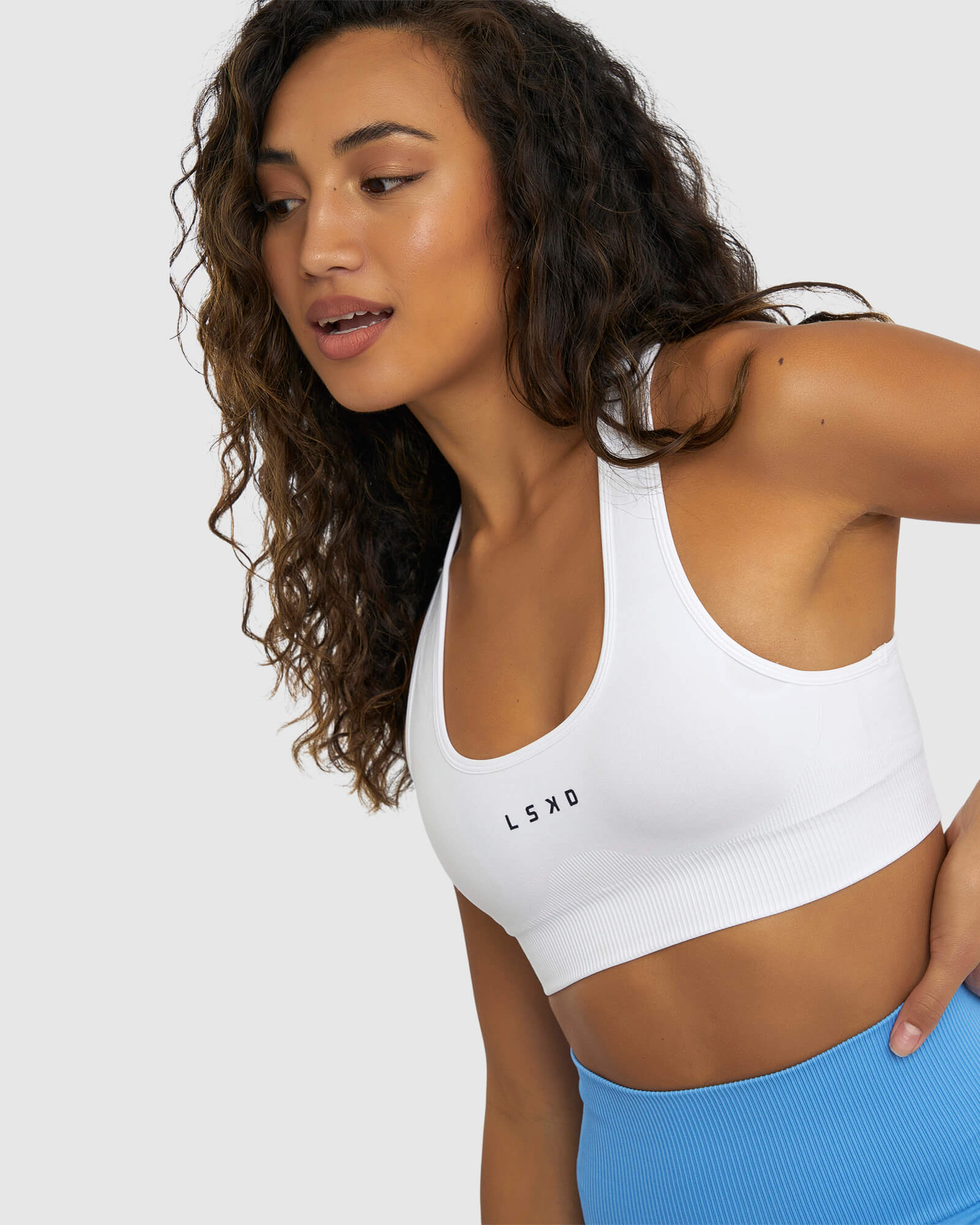 Model wearing Limitless Seamless Sports Bra - White