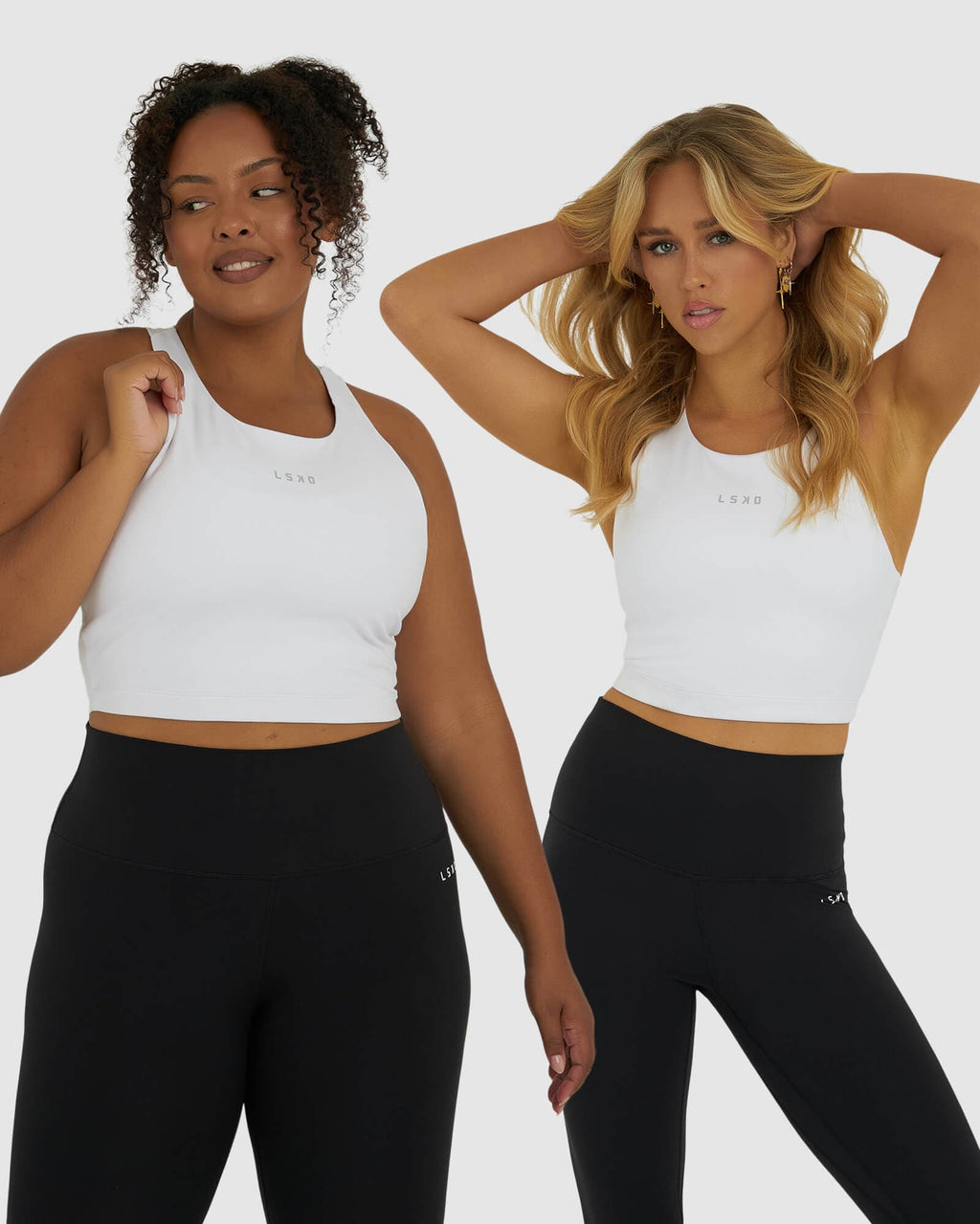 Model wearing Base Crop Tank - White