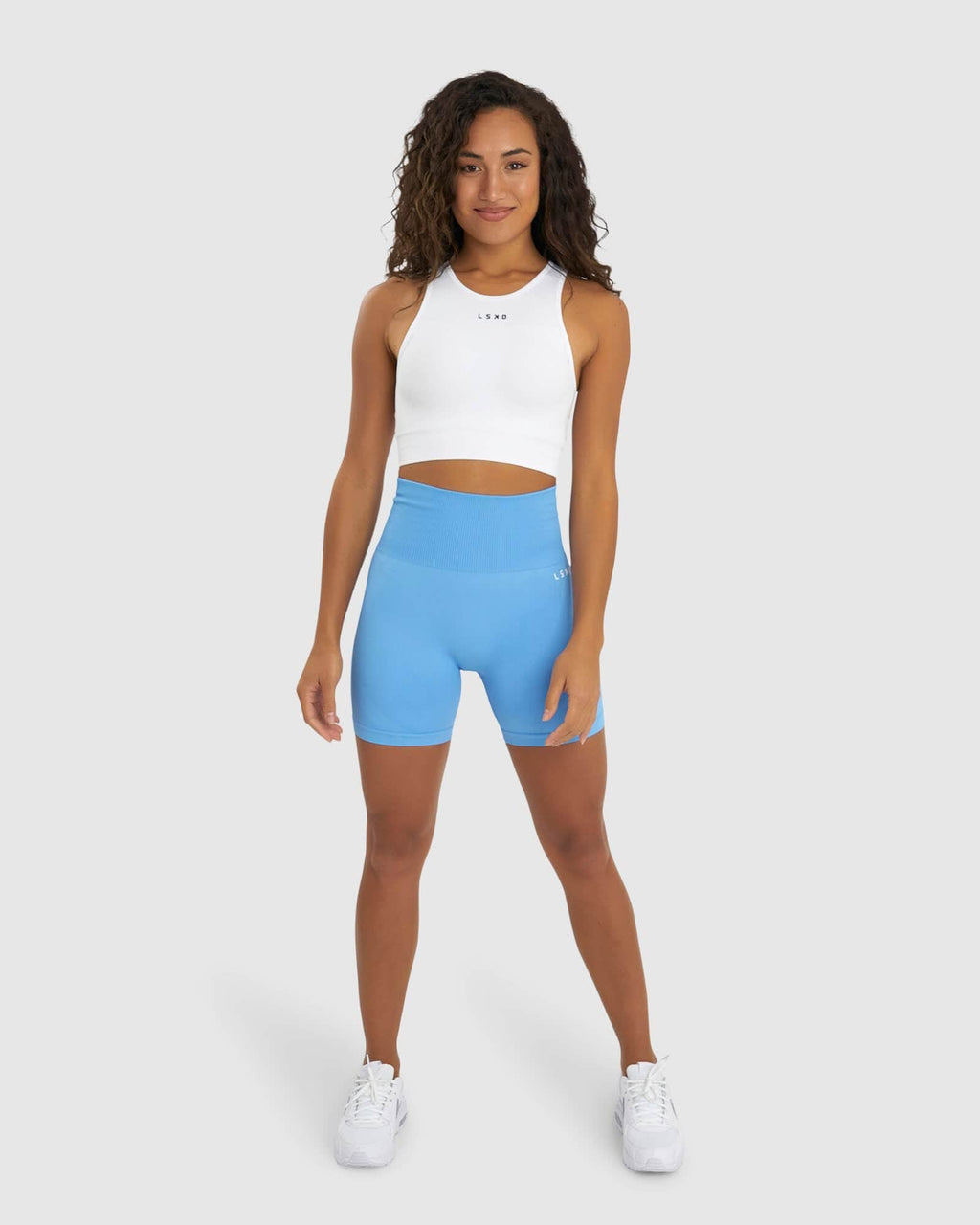 Model wearing Limitless Seamless Crop Top - White